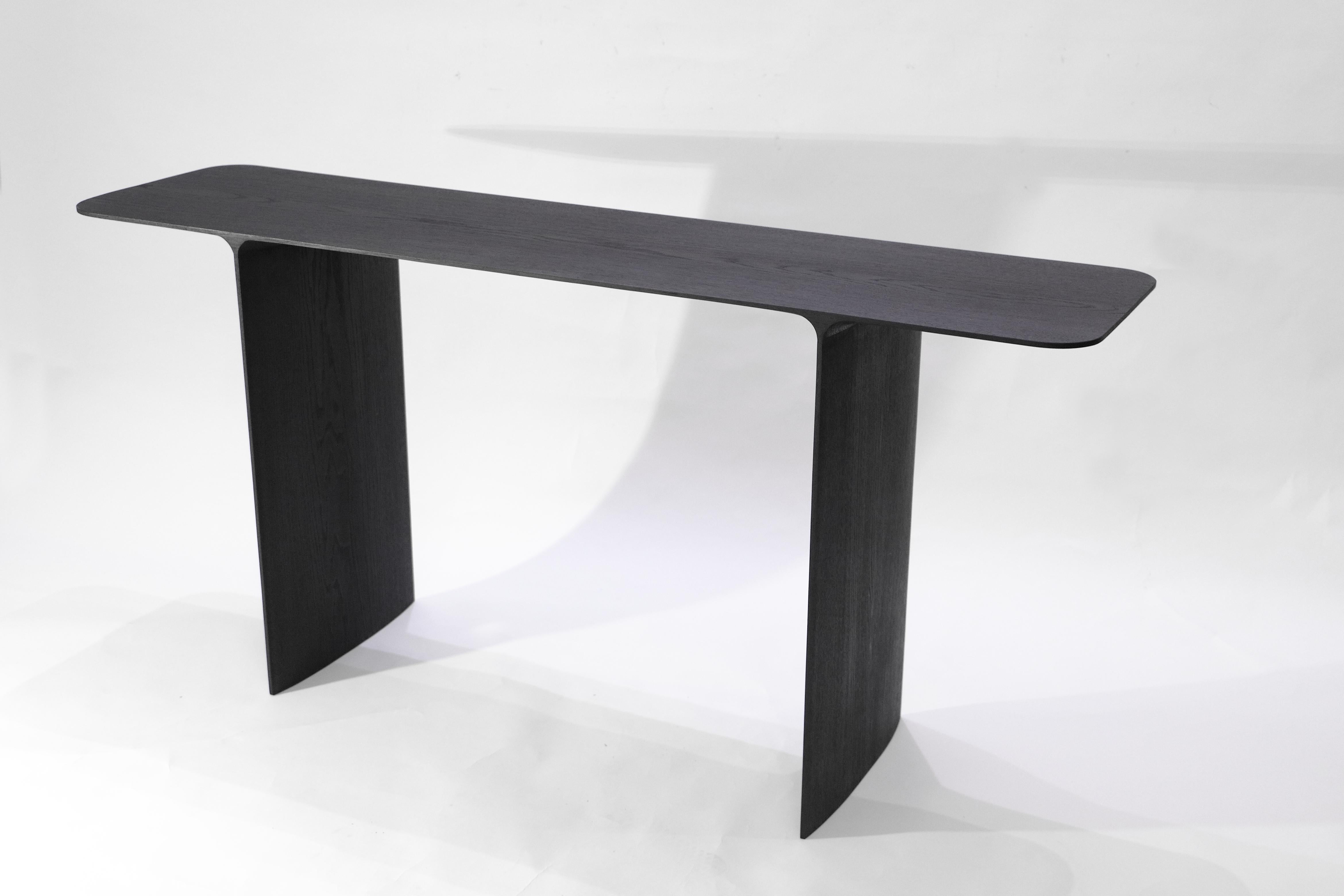 Shave console desk, hand-sculpted and signed by Cedric Breisacher
Hand-sculpted and signed by Cedric Breisacher
Materials: Oak , Oxyde black
Dimension: L 160 x l 40 x H 80
Can be made to order in other dimensions and finishes

Designer-sculptor,