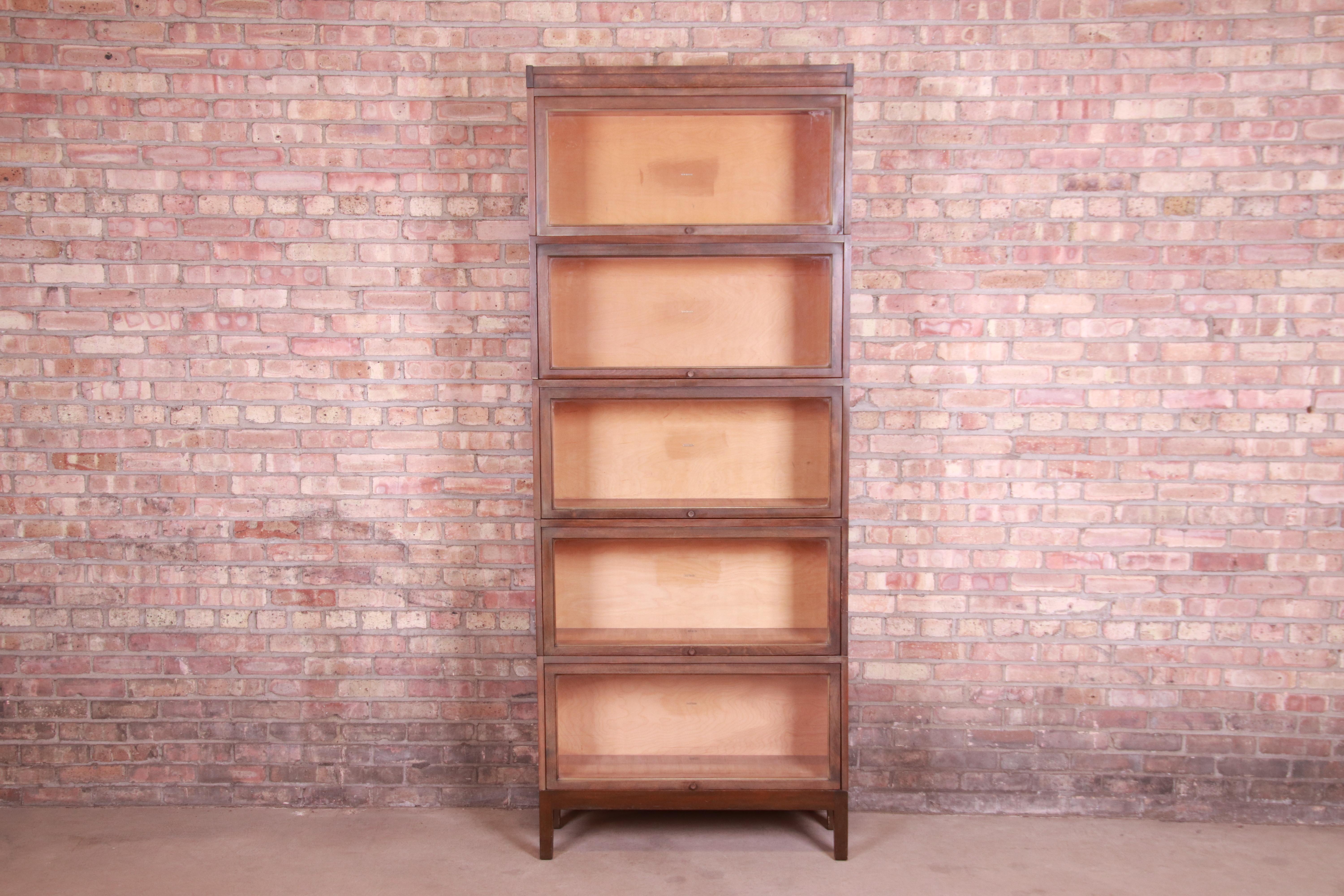 A gorgeous vintage Arts & Crafts five-stack barrister bookcase

By Shaw Walker

USA, Circa 1920s

Birch, with glass front doors and original brass hardware.

Measures: 34