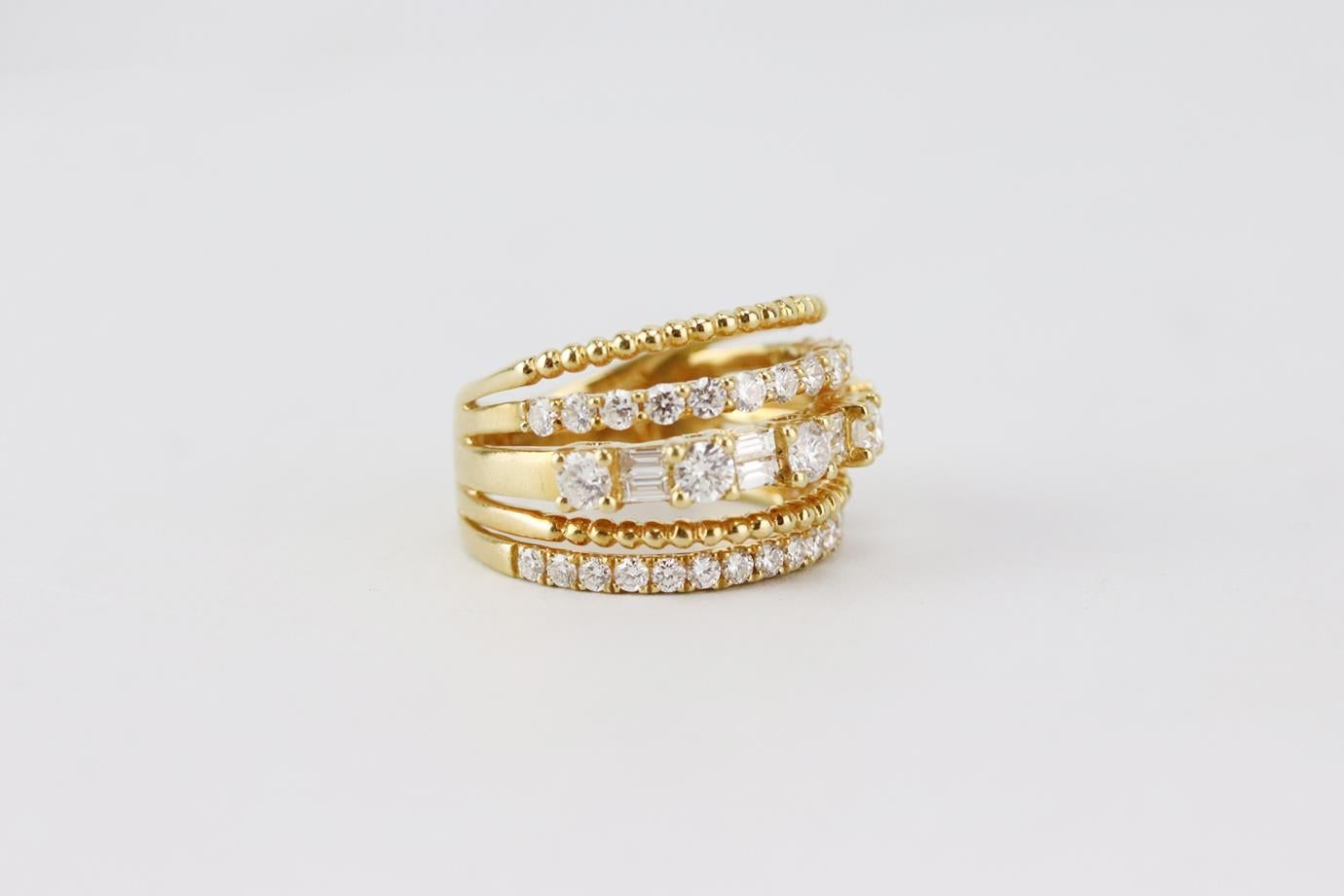 SHAY 18k yellow gold and mixed diamond ring. Made from 18k yellow-gold with 28 pave diamonds and 8 baguette diamonds and 5 additional diamonds weighing 1.65 cts. Yellow-gold. Does not come with box or dustbag. Ring Size: 16 mm. Length: 1 in
