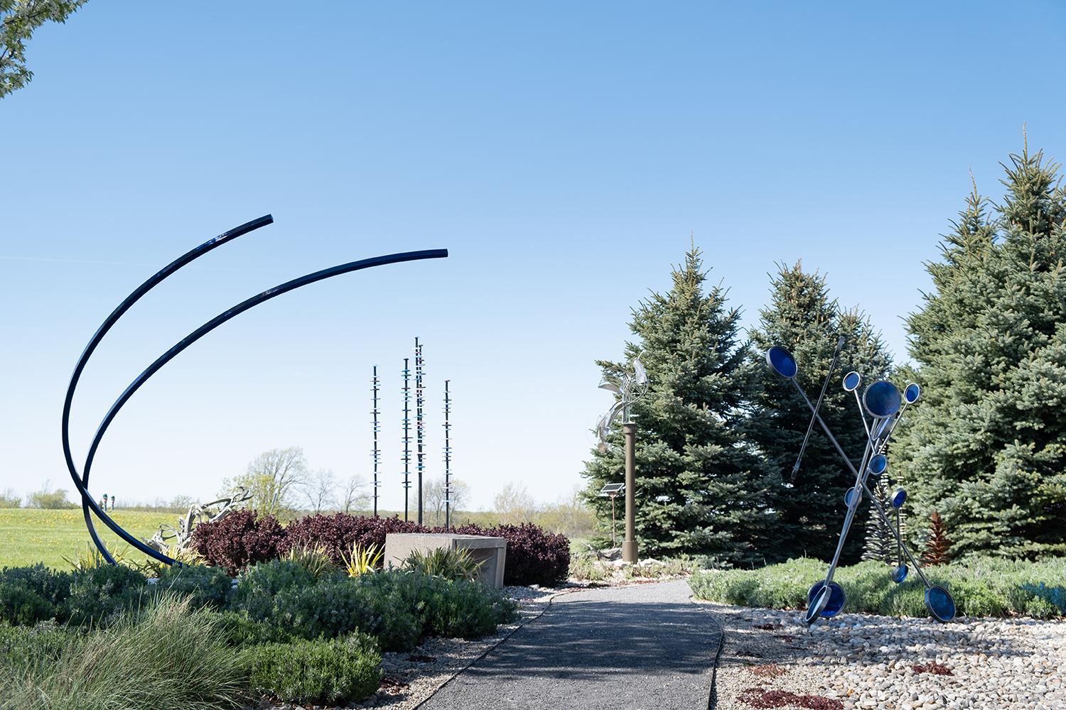 Arc - large scale, blue, geometric abstract, coated steel outdoor sculpture - Sculpture by Shayne Dark