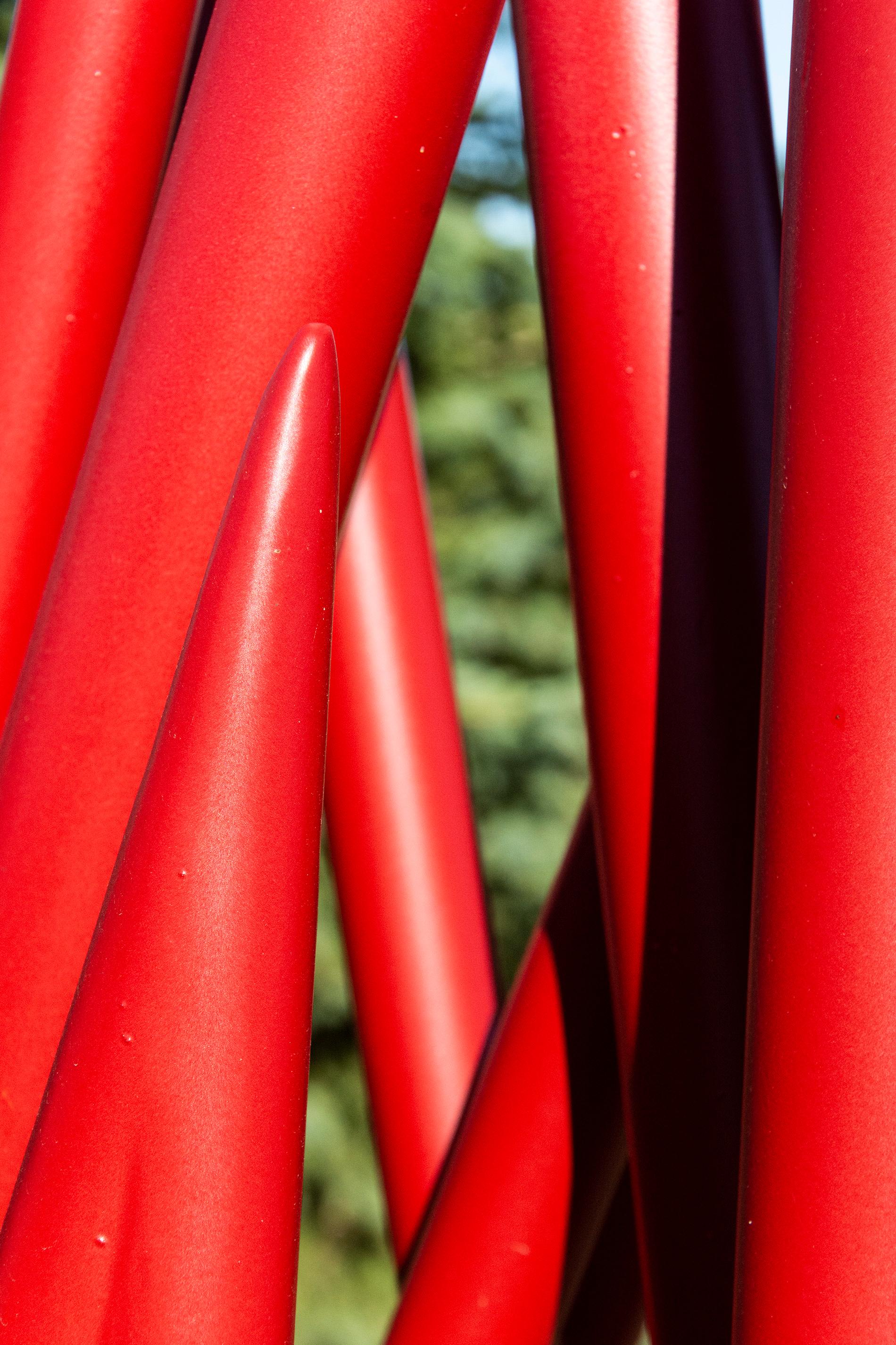 Spires - Red - large scale, intersecting spires, coated steel, outdoor sculpture - Contemporary Sculpture by Shayne Dark