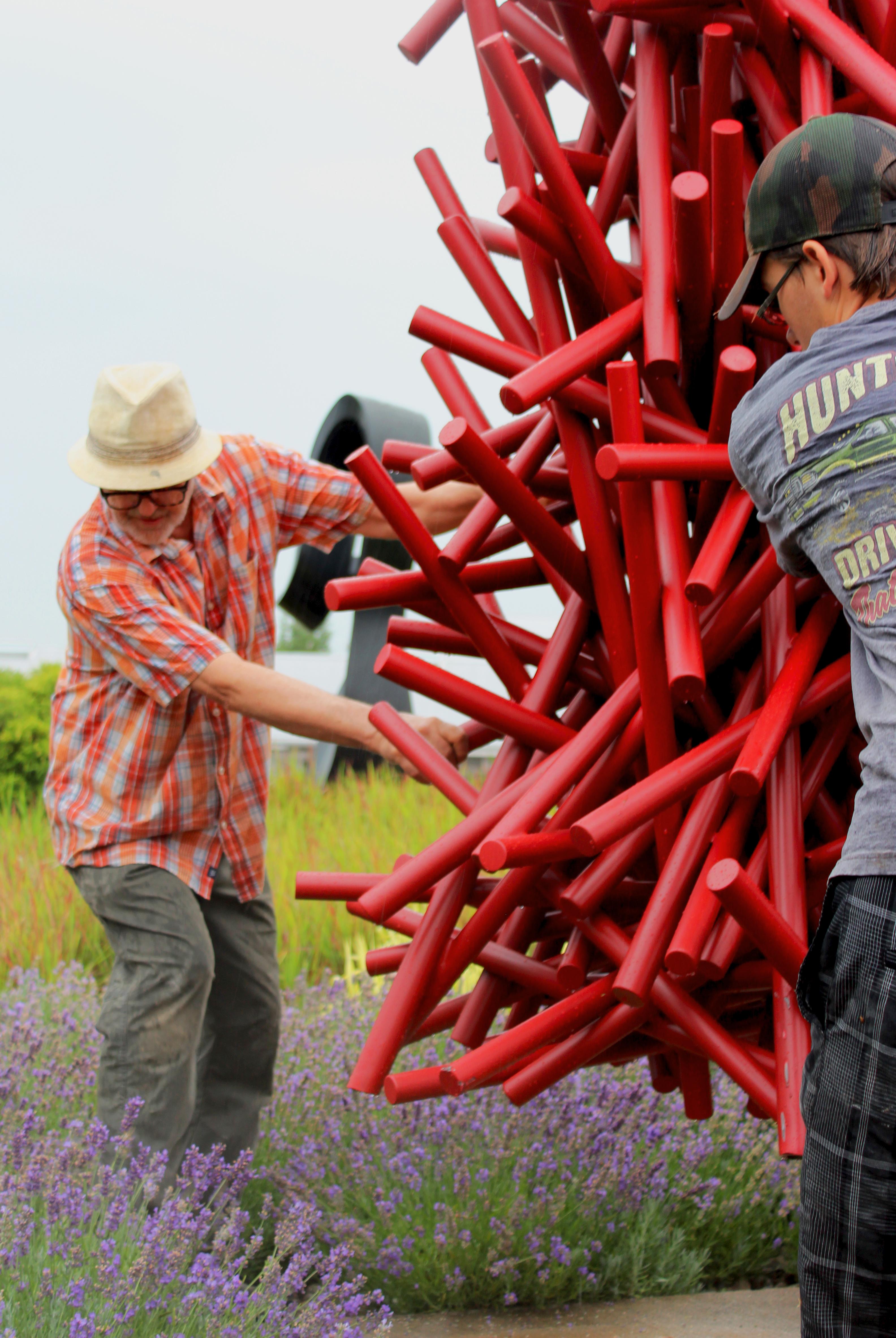 Tangled Column Red - Tall, bright, geometric abstract, coated steel sculpture - Contemporary Sculpture by Shayne Dark