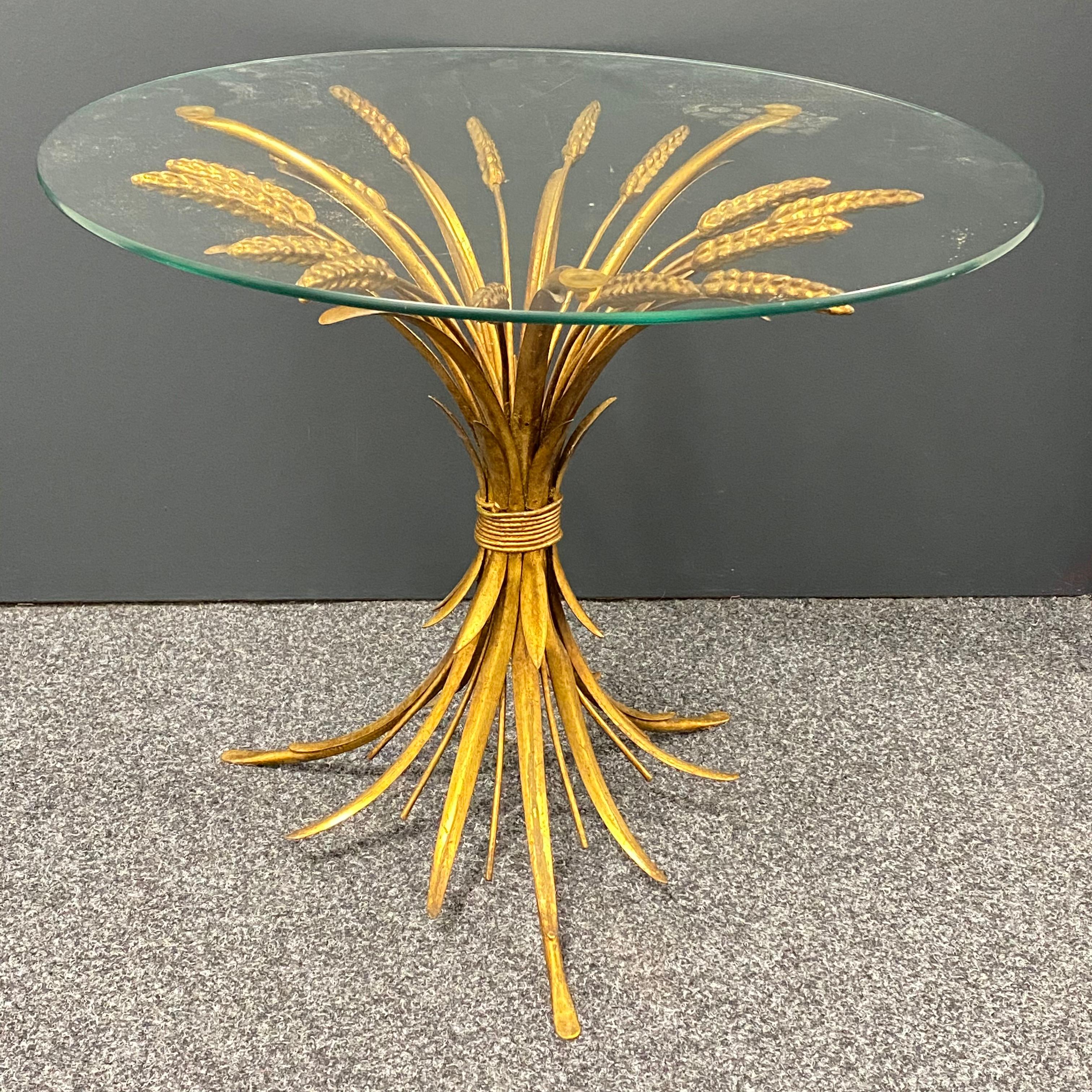 Offered is this beautiful Hollywood Regency gilded and silvered rose flower accent table with smoked glass top. Made in Italy.