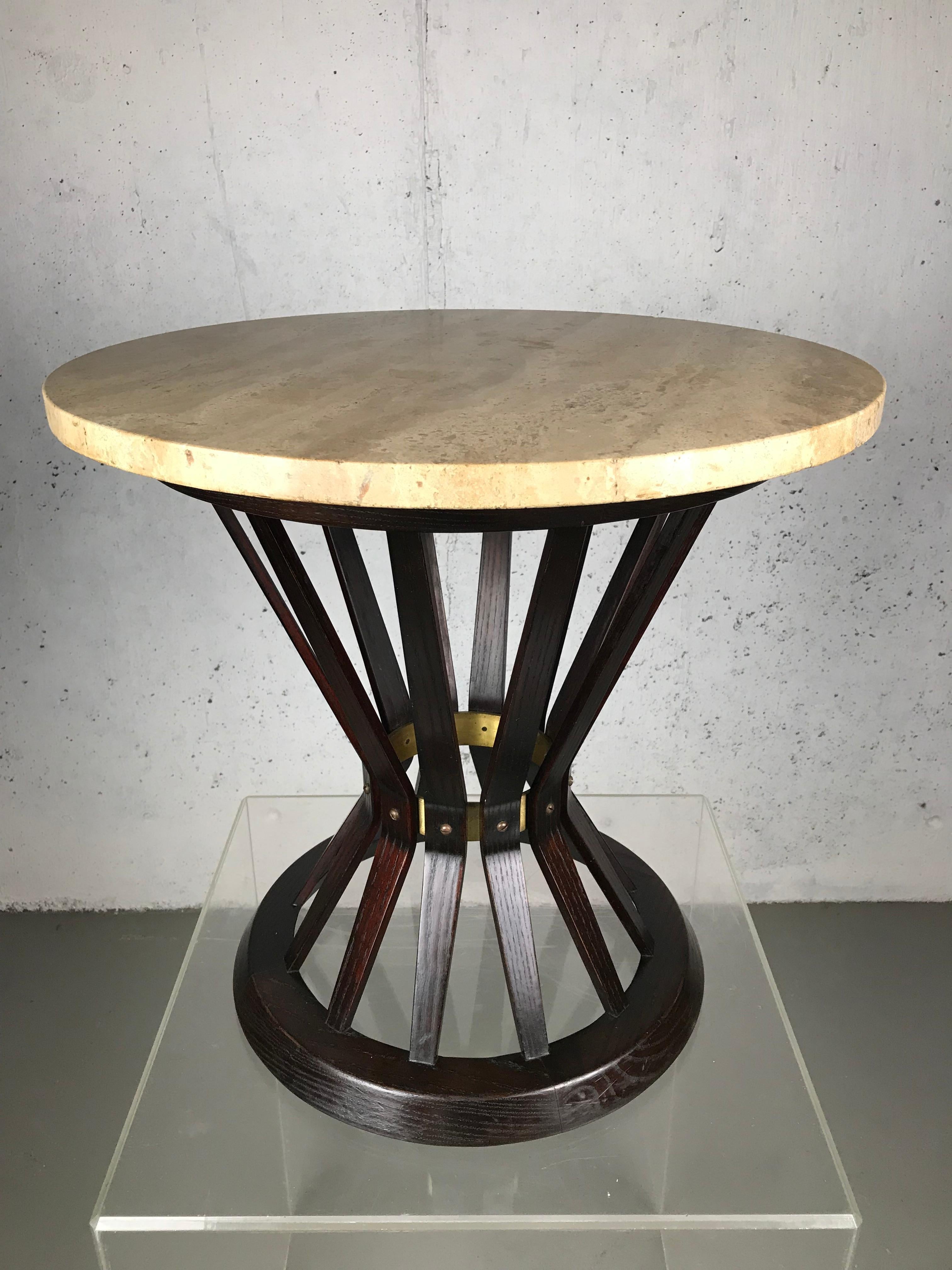 Intricate sheaf of wheat side table designed by Edward Wormley for Dunbar Furniture Corp. This table retains its original travertine marble top and is in original condition with minor wear. The top retains its paper label and the gold Dunbar Badge