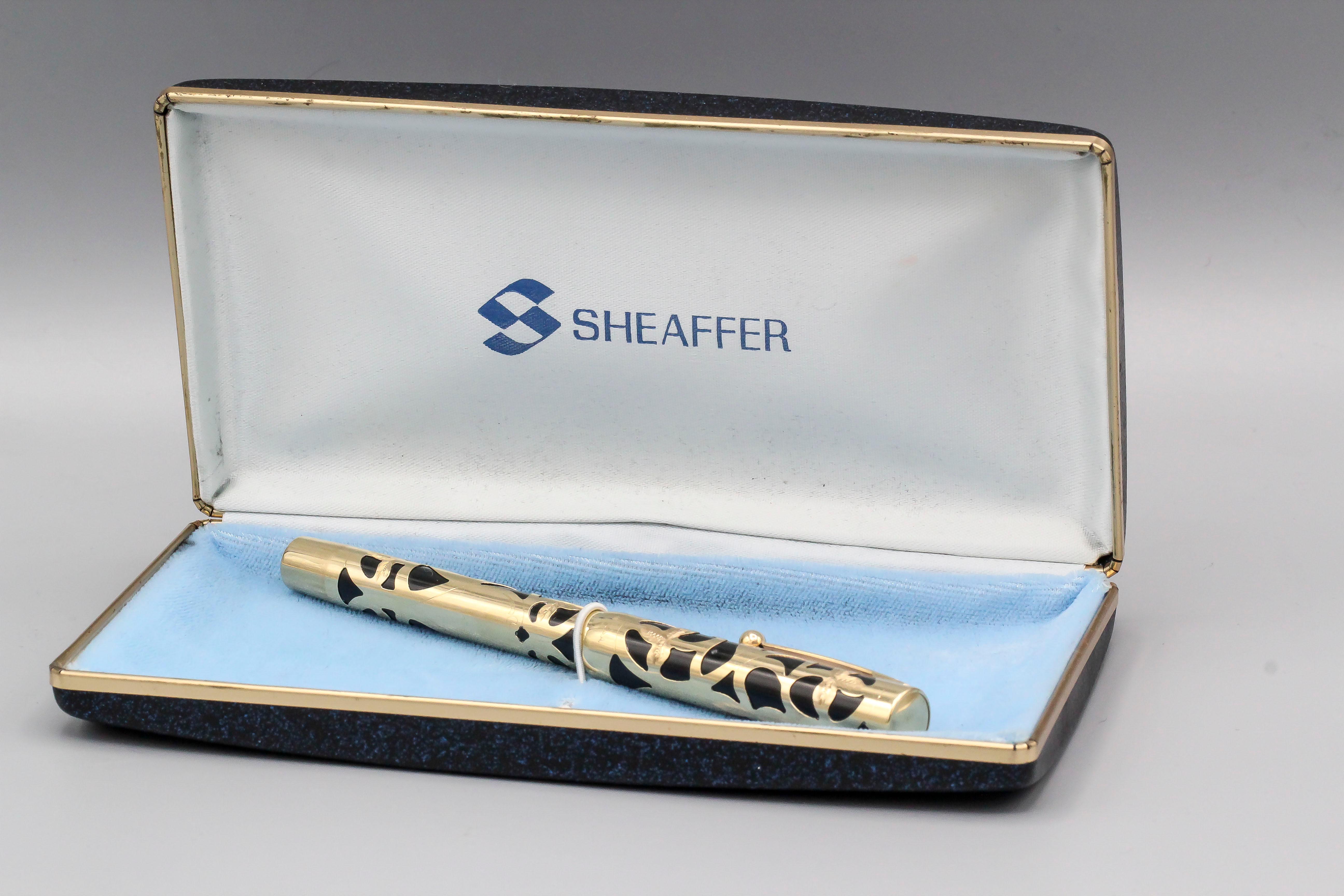 Elegant 14K yellow gold fountain pen by Sheaffer, made in the USA.

Hallmarks: Sheaffer, 14K, Made in USA (on case and nib)