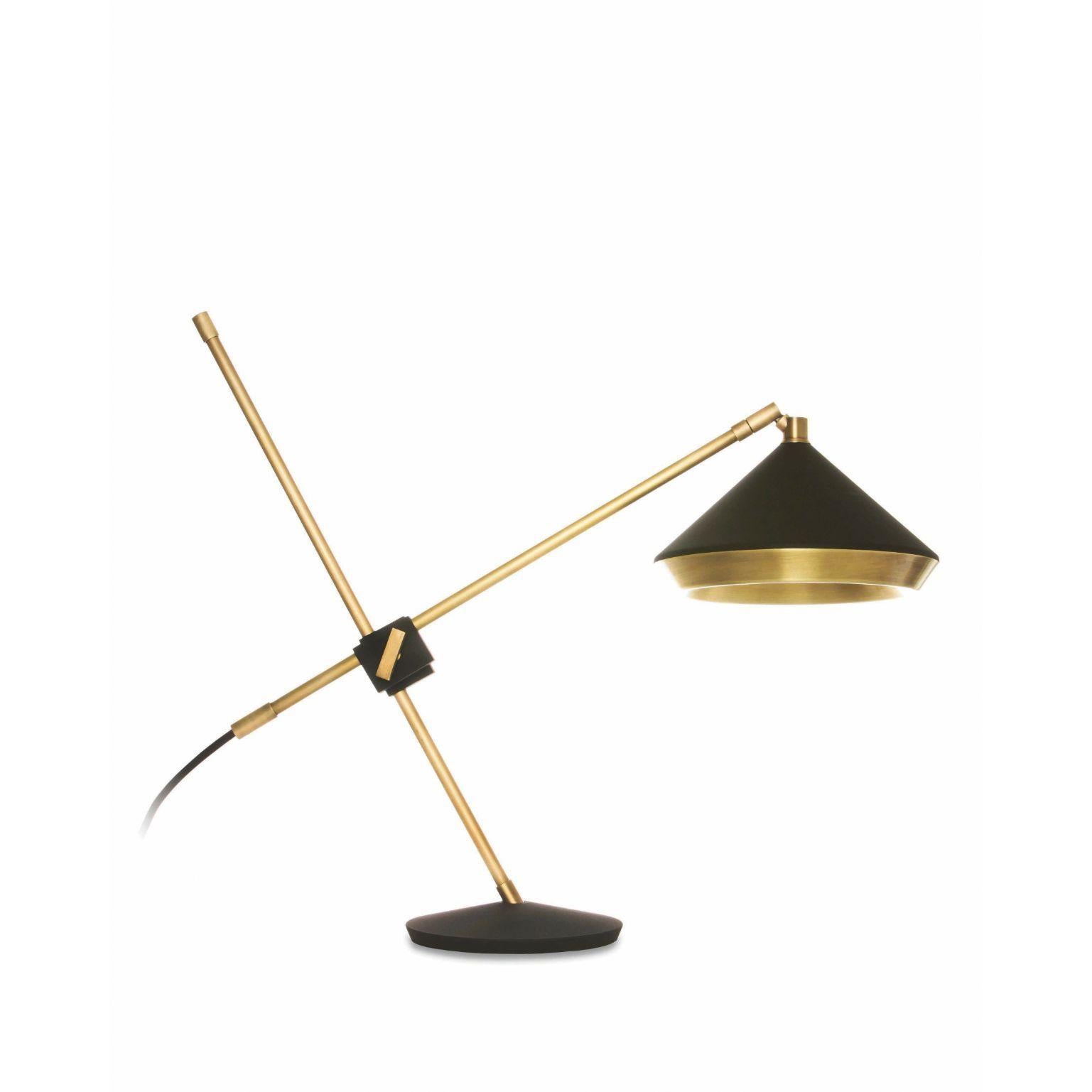 Shear table light - Brass - Black by Bert Frank
Dimensions: 47 x 47 x 15 cm
Materials: Brass

When Adam Yeats and Robbie Llewellyn founded Bert Frank in 2013 it was a meeting of minds and the start of a collaborative creative partnership with