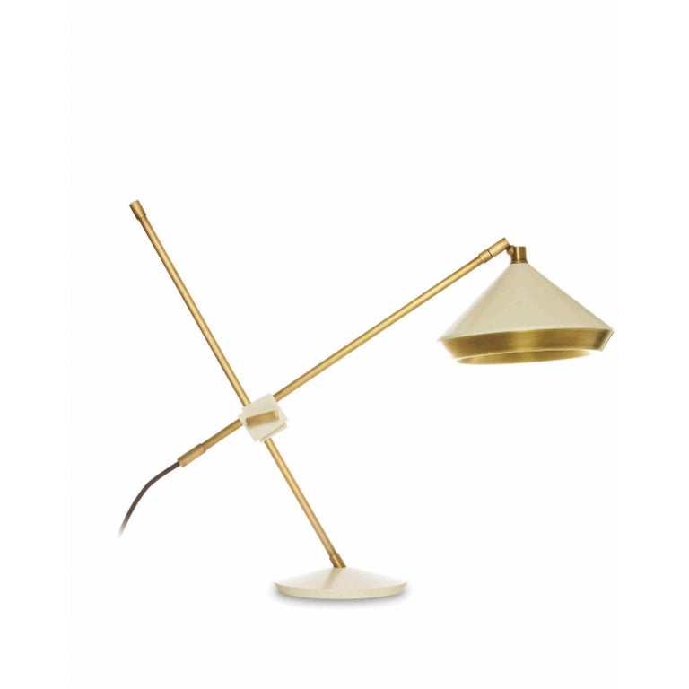 Shear table light - brass - white by Bert Frank
Dimensions: 47 x 47 x 15 cm
Materials: Brass

When Adam Yeats and Robbie Llewellyn founded Bert Frank in 2013 it was a meeting of minds and the start of a collaborative creative partnership with