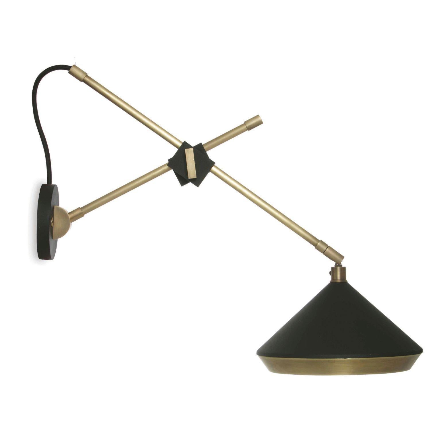 Shear wall light - brass - black by Bert Frank
Dimensions: 40 x 20 x 46 cm
Materials: Brass

When Adam Yeats and Robbie Llewellyn founded Bert Frank in 2013 it was a meeting of minds and the start of a collaborative creative partnership with