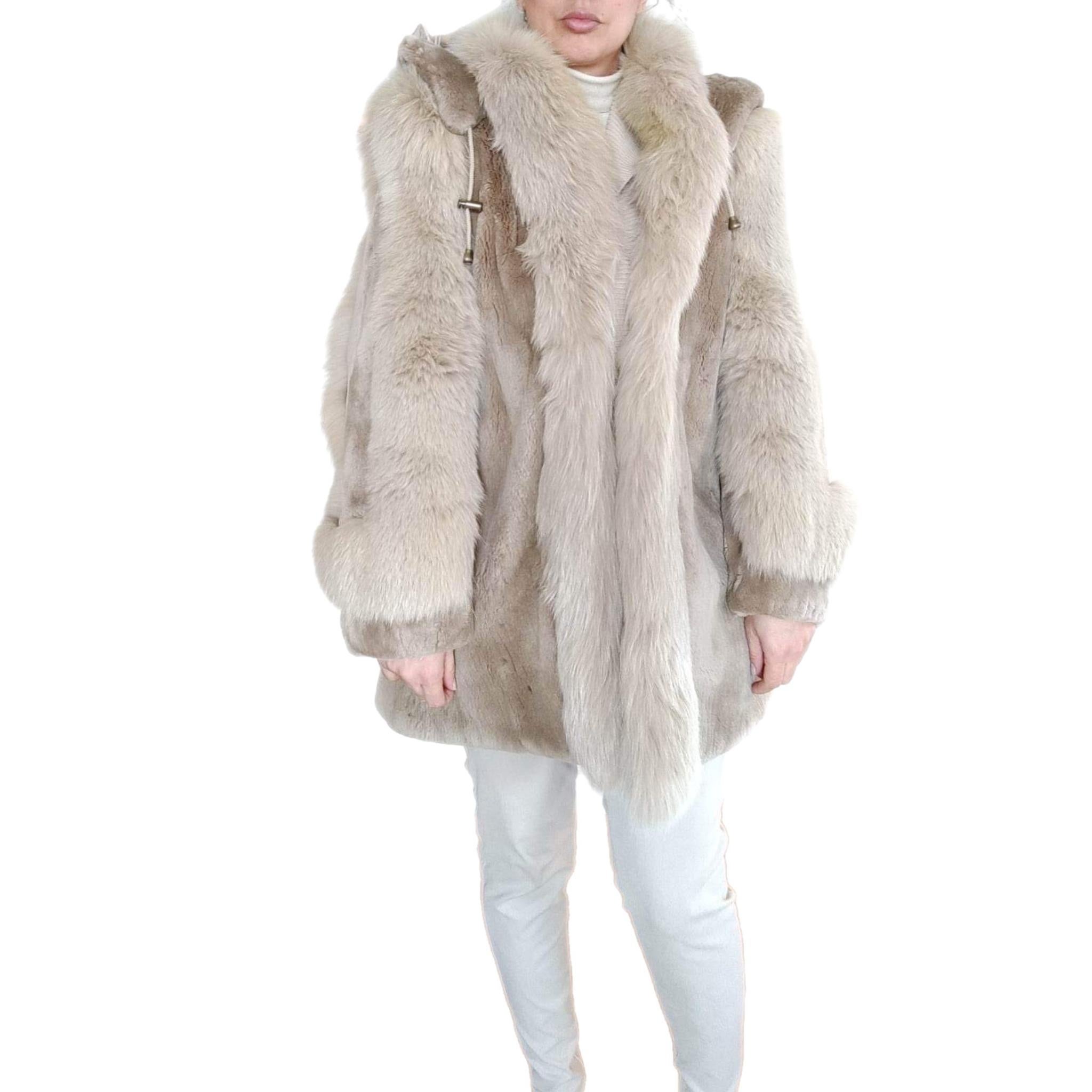 PRODUCT DESCRIPTION:

Sheared Beaver Fur Coat with Fur Trim (Size 8-M)

Condition: good 

Closure: Hooks & Eyes

Color: Cream, beige

Material: Sheared Beaver

Garment type: short jacket

Sleeves: Dolman with bracelet cuff

Pockets: Two side