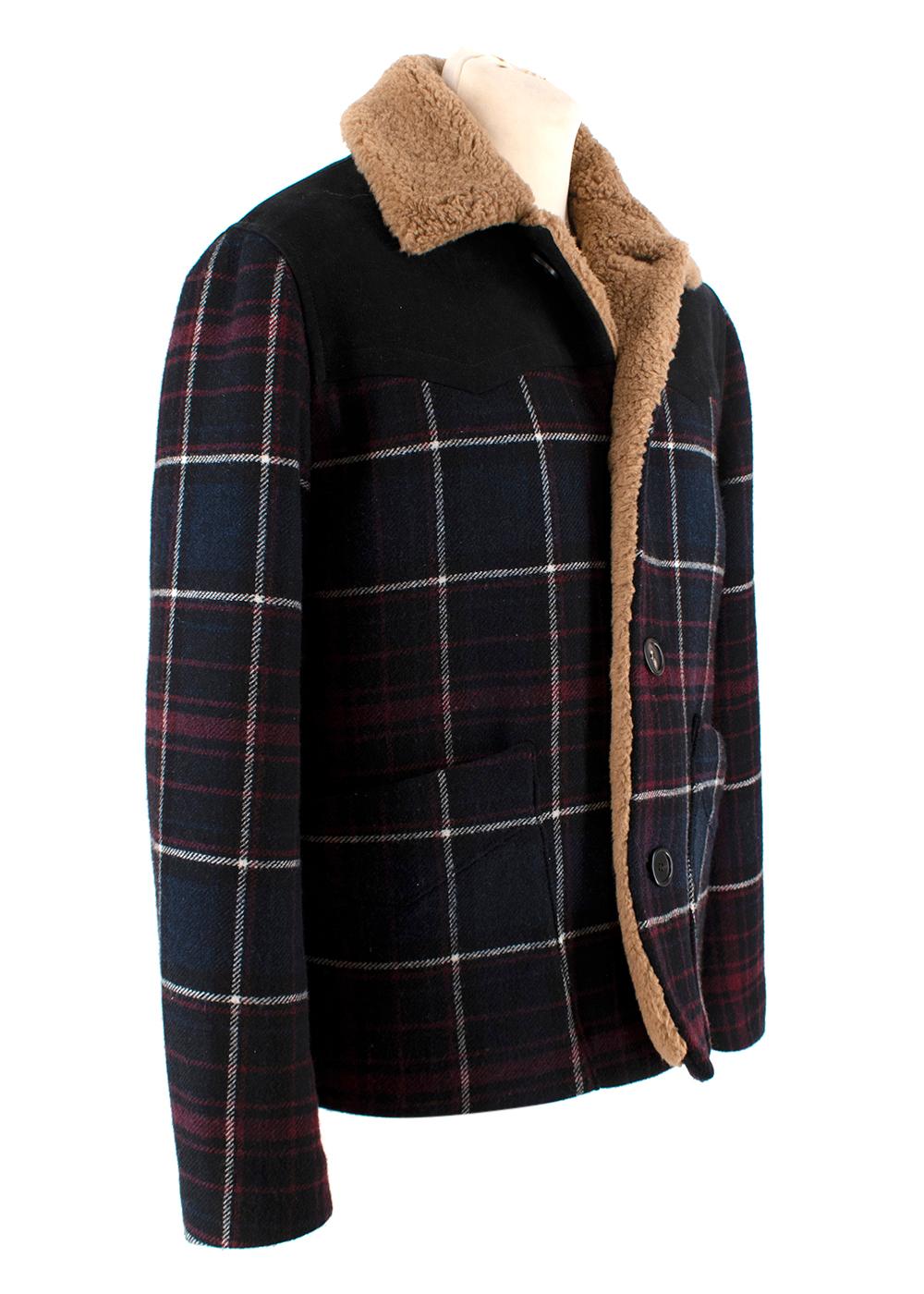 Marni Shearling Lined Check Wool Coat

- Lumberjack-style jacket with a windowpane woolen outer, and suede shoulder patches
- Lined in tan brown shearling
- Button front
- Interior slip pocket

Materials 
outer 
89% Wool
11% Polyamide 
Secondary