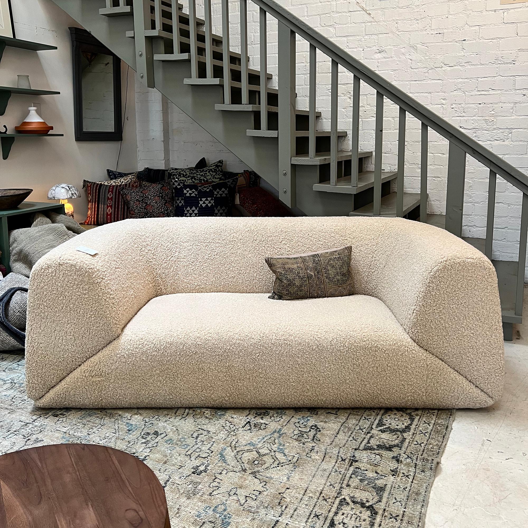 Gorgeous vintage sofa newly reupholstered in shearling. See in person at our Los Angeles showroom.