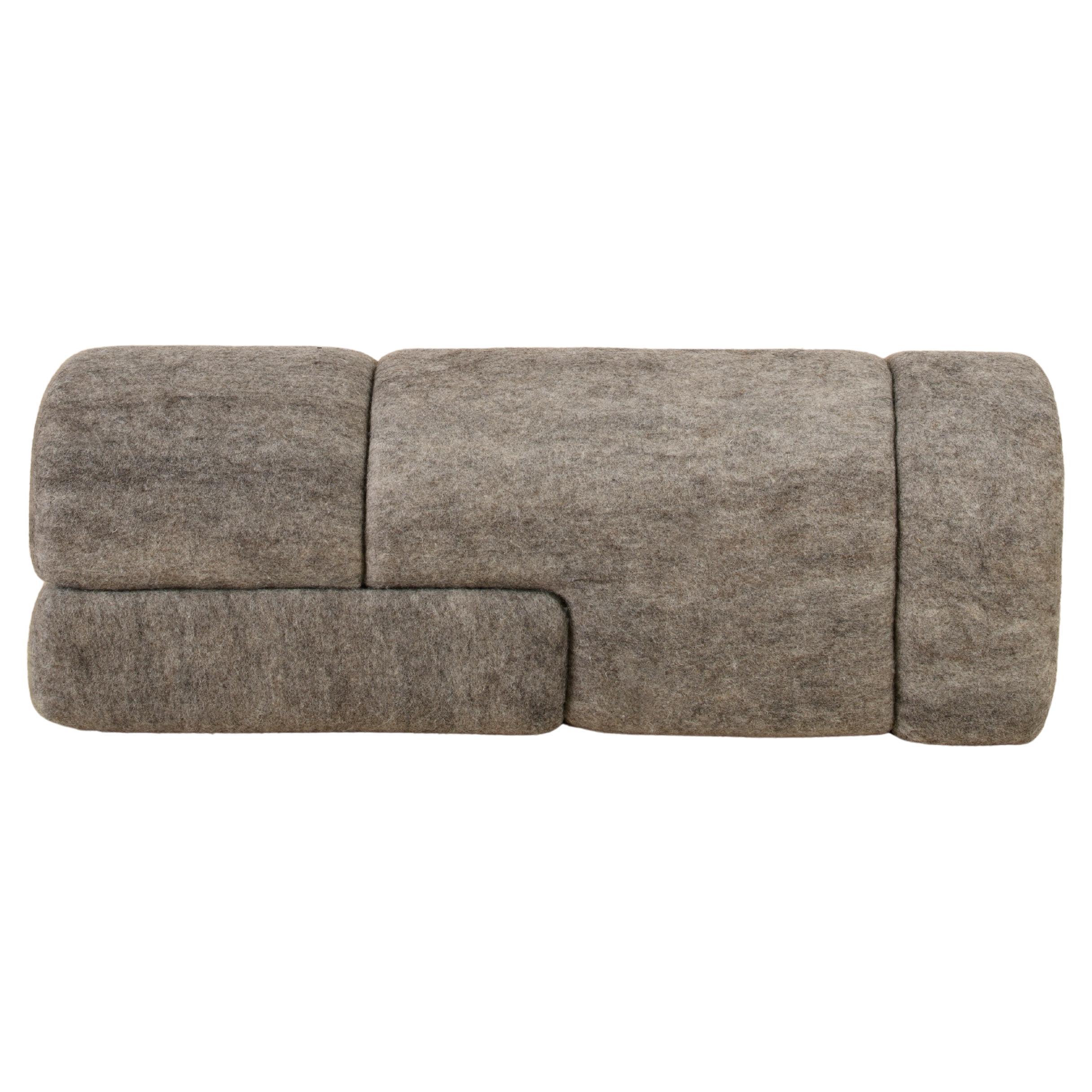 Sheep bench is designed by Studio Ahead. The bench is upholstered in custom cream merino wool felt from Northern California sheep. Each side design is unique. Designed and fabricated in North California. 

The form of the bench is inspired by the