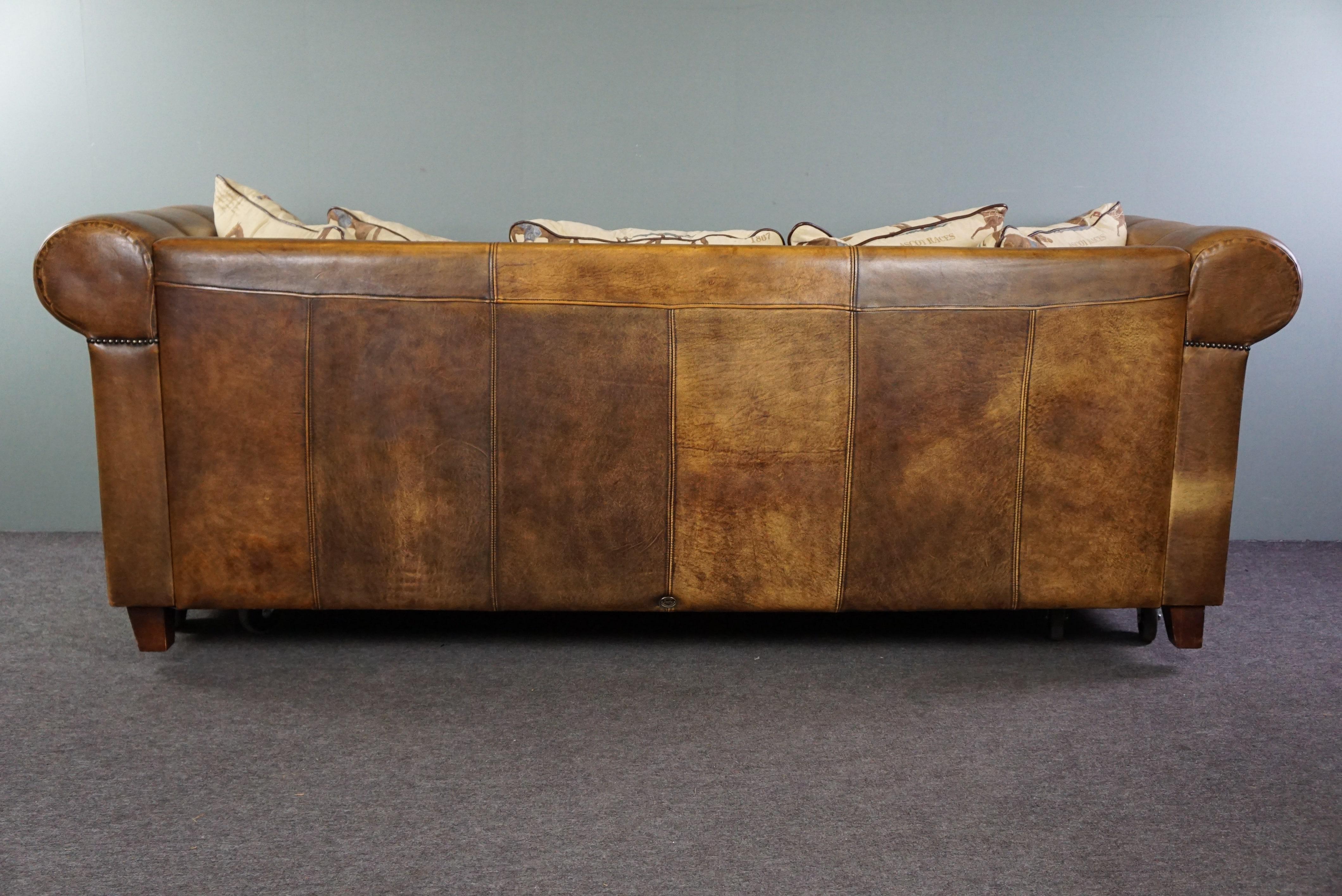 leather couch with fabric cushions