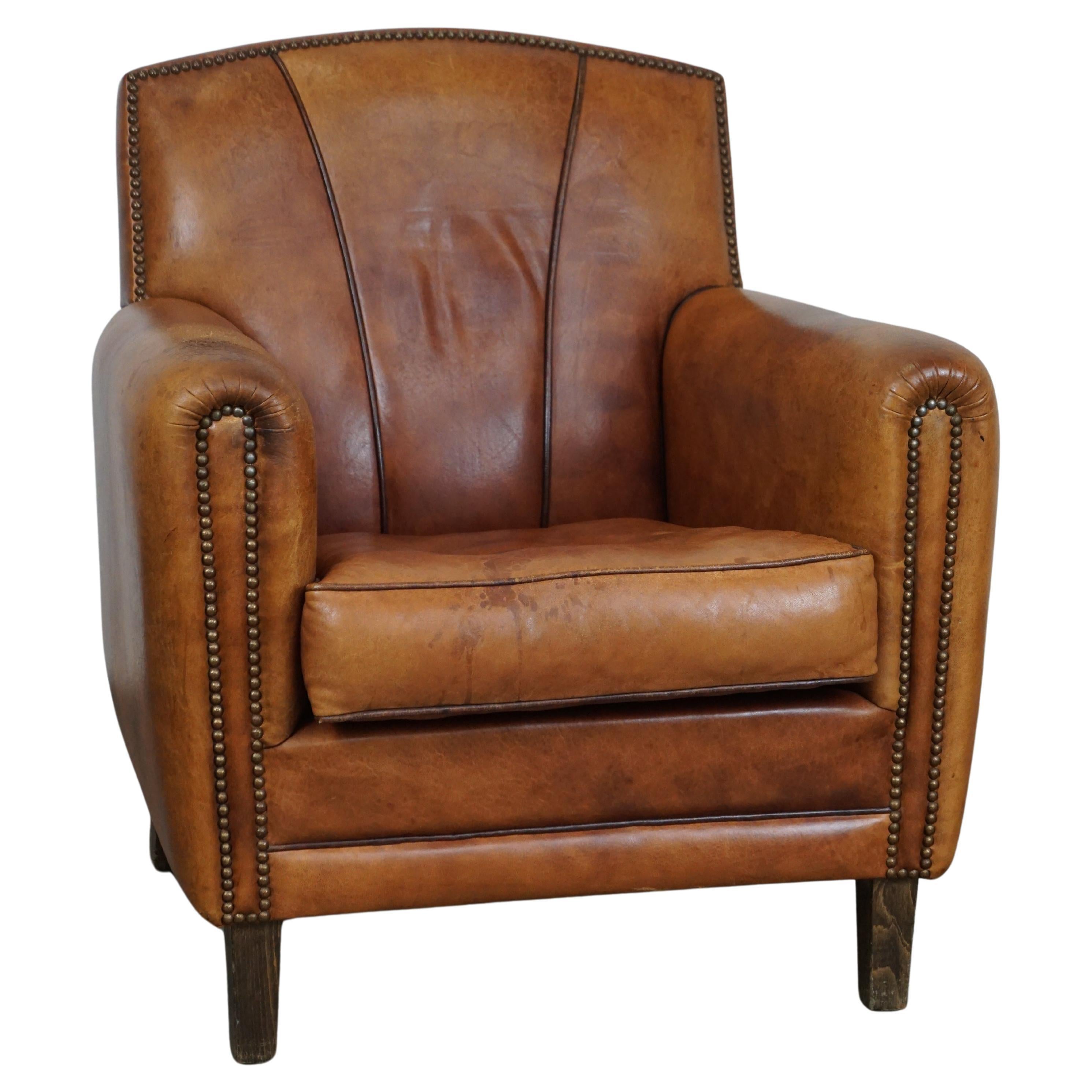 Sheep leather armchair with Art Deco design and a beautiful appearance