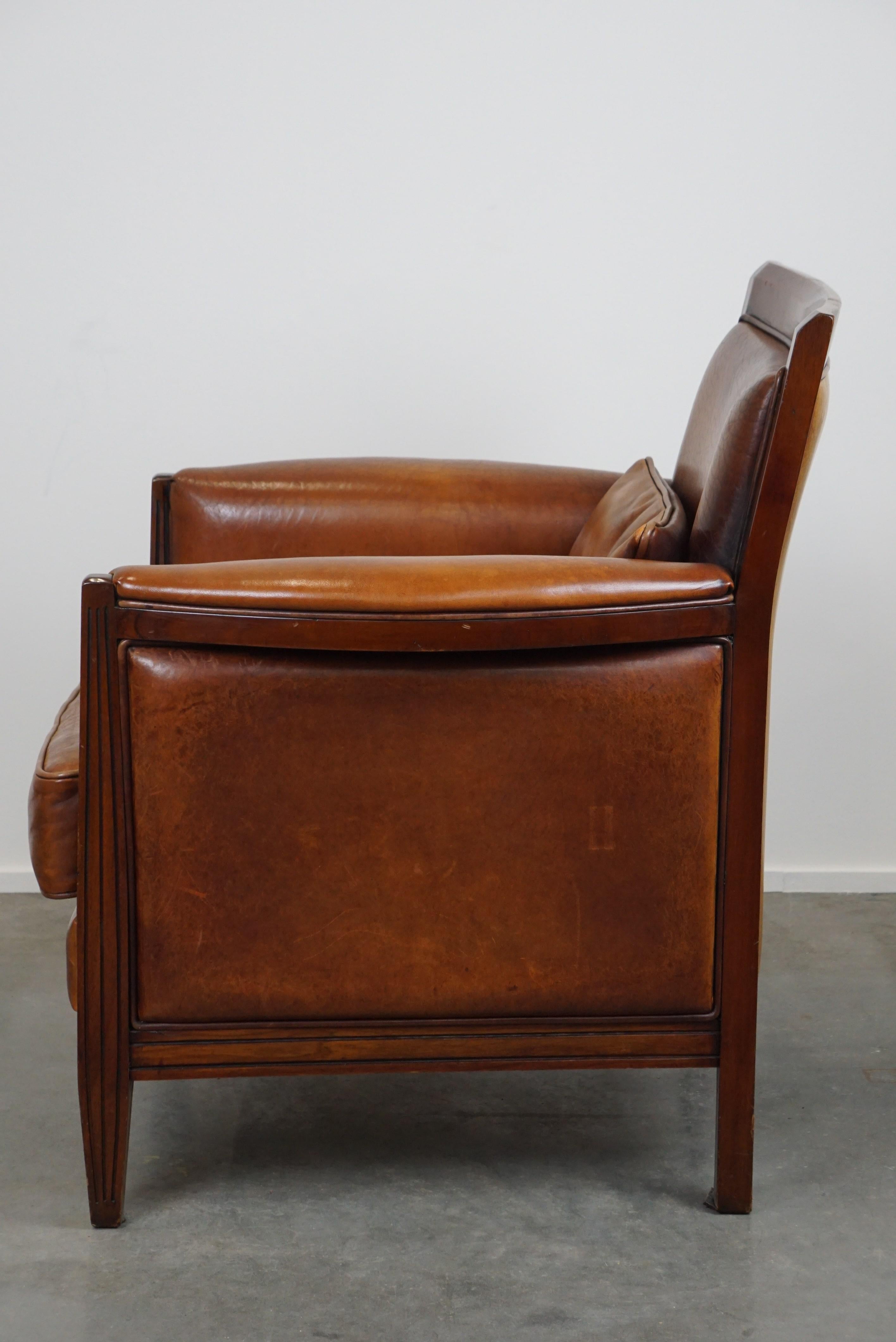 Leather Sheep leather Art Deco design armchair with high seating comfort For Sale