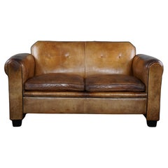 Sheep leather Art Deco sofa designed by Bart Van Bekhoven, spacious 2 seater