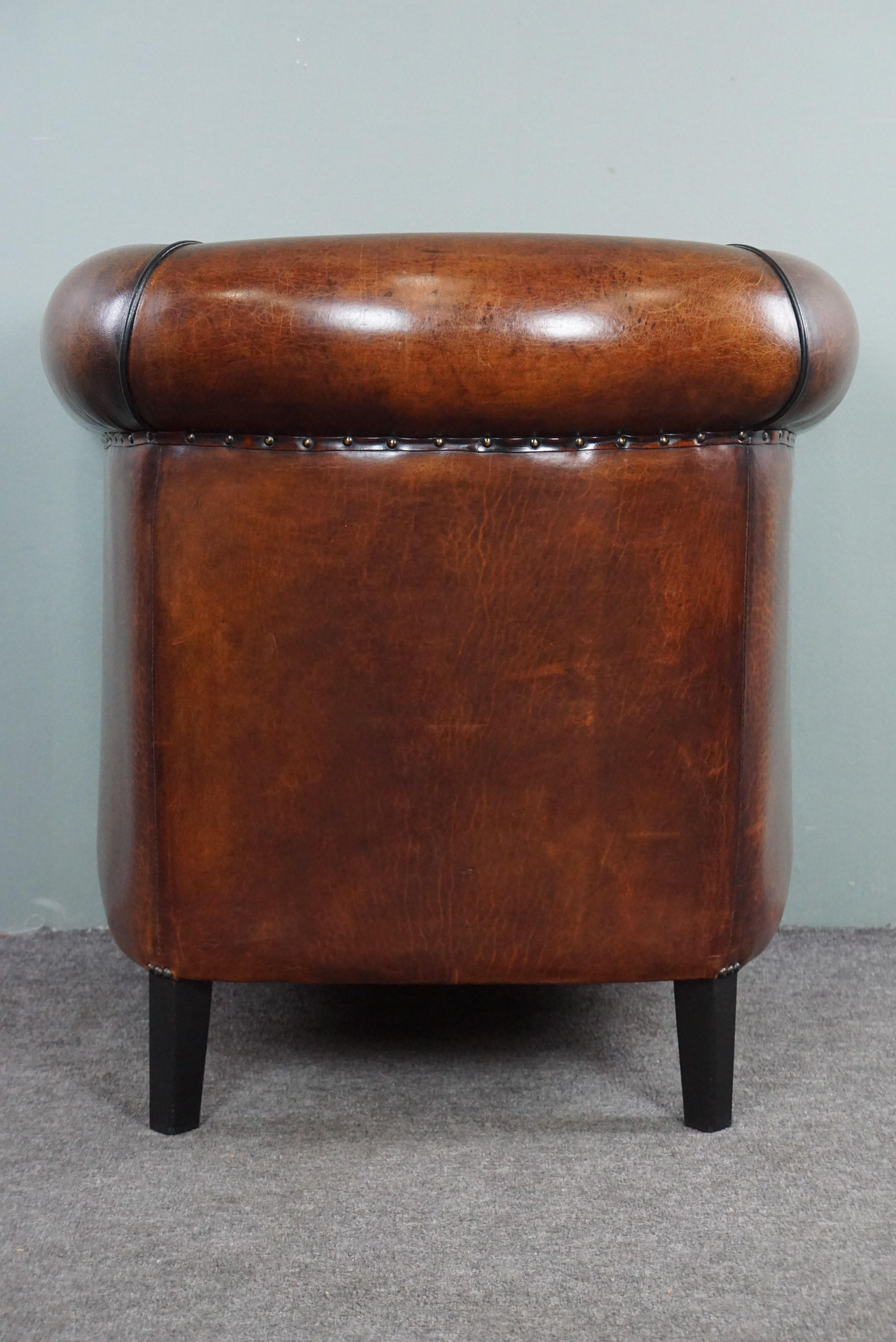 Hand-Crafted Sheep leather club chair with black piping and decorative nails For Sale