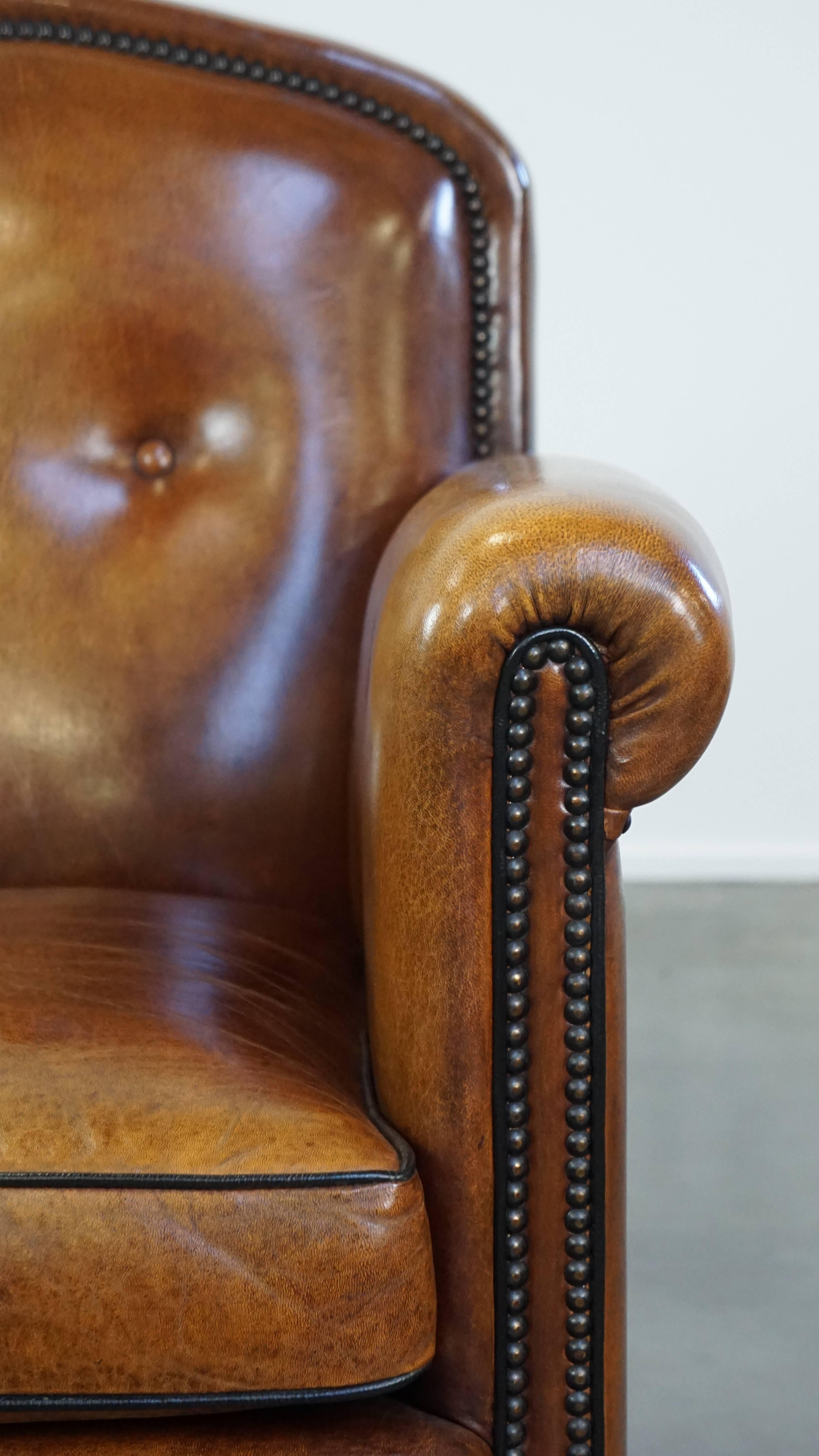 Sheep leather design armchair finished with decorative nails and black piping For Sale 6