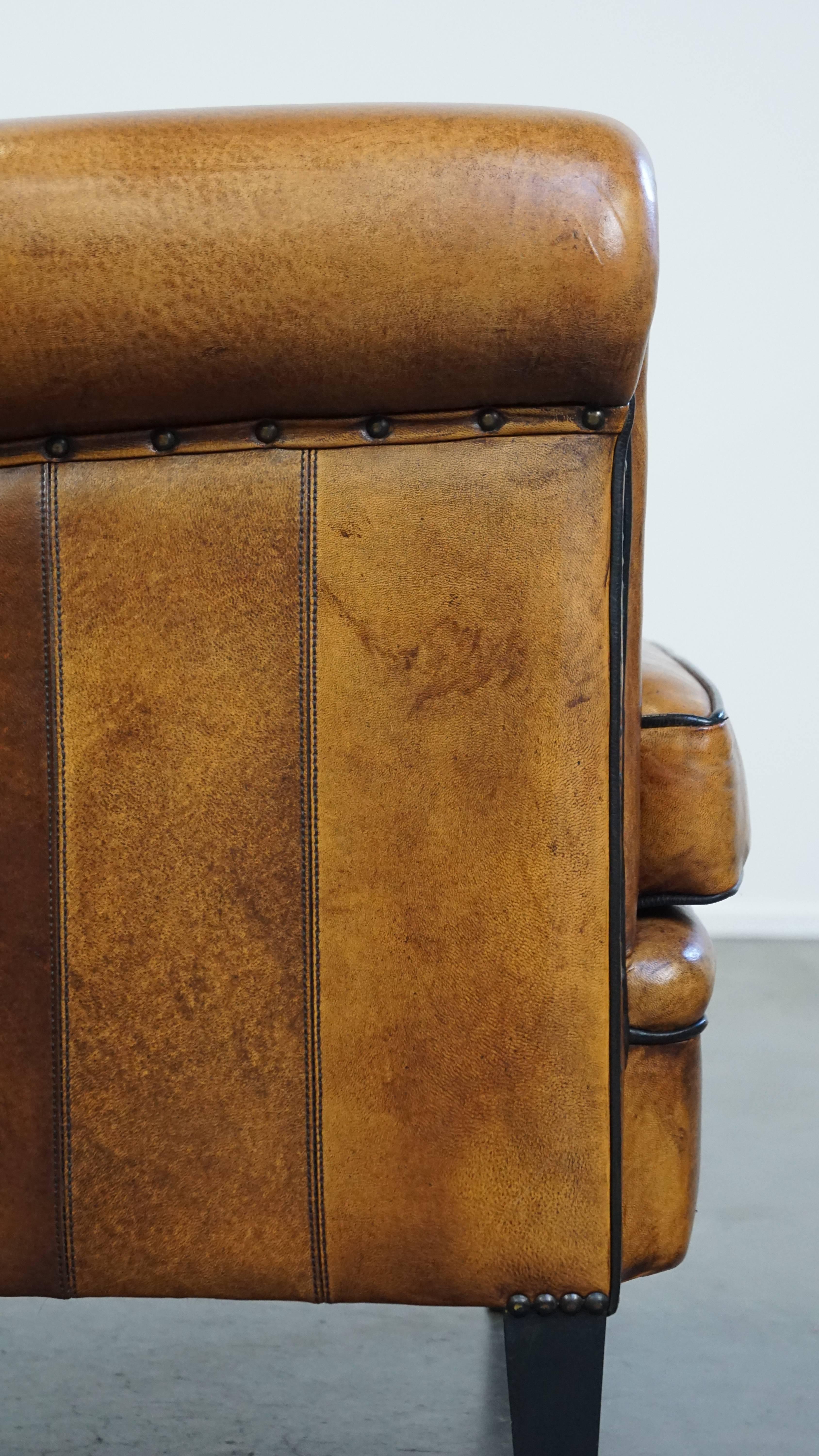 Sheep leather design armchair finished with decorative nails and black piping For Sale 3