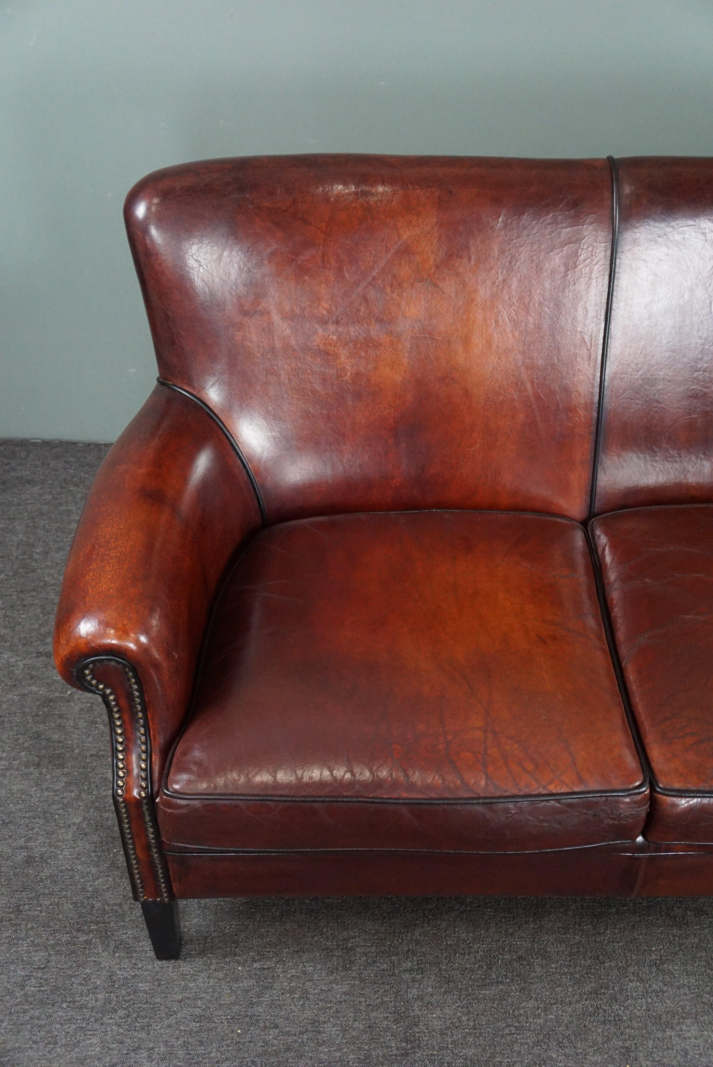 Sheep leather sofa finished with black piping, 3 seater In Good Condition For Sale In Harderwijk, NL