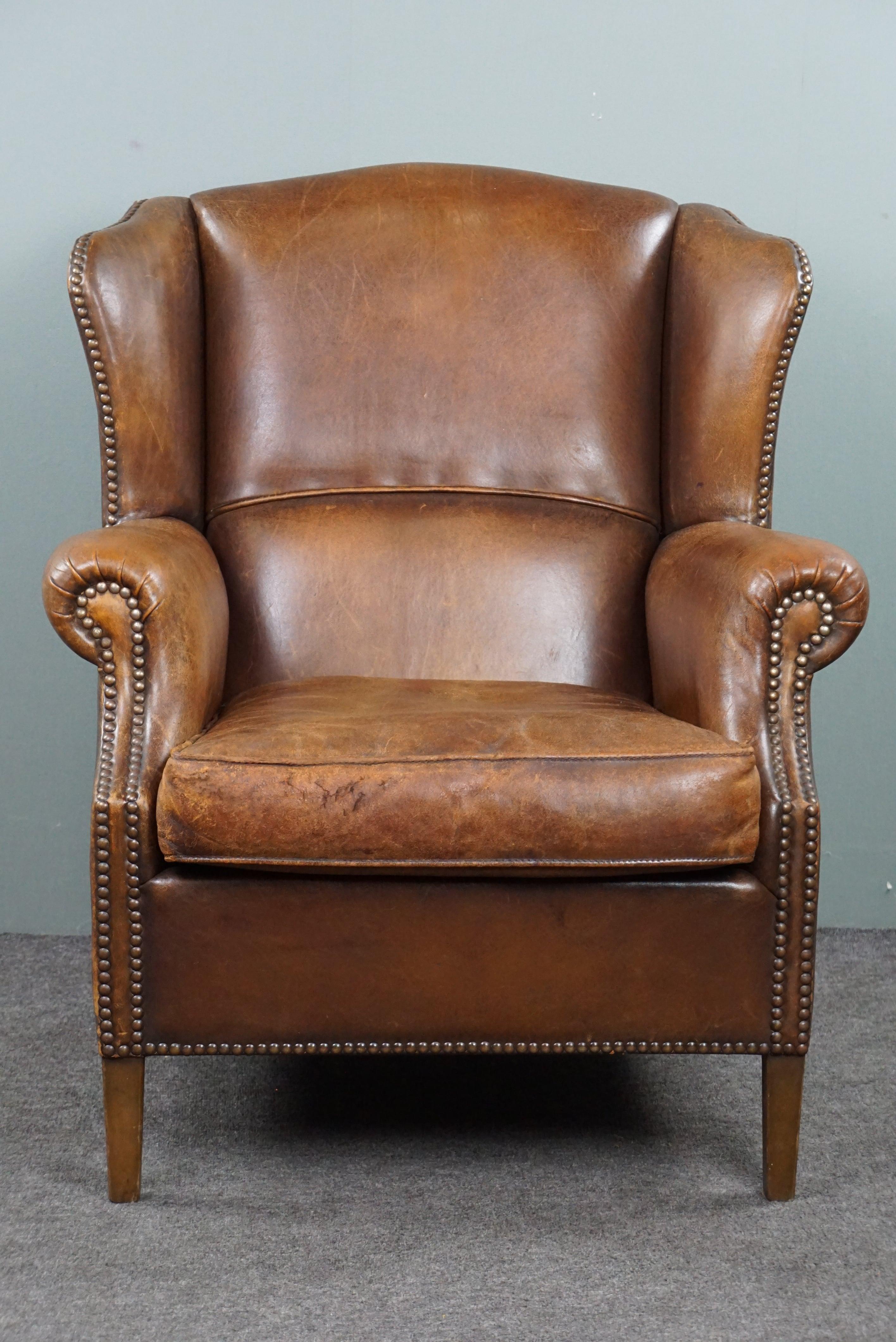 Sheep Leather Wing Chair with Character In Good Condition For Sale In Harderwijk, NL