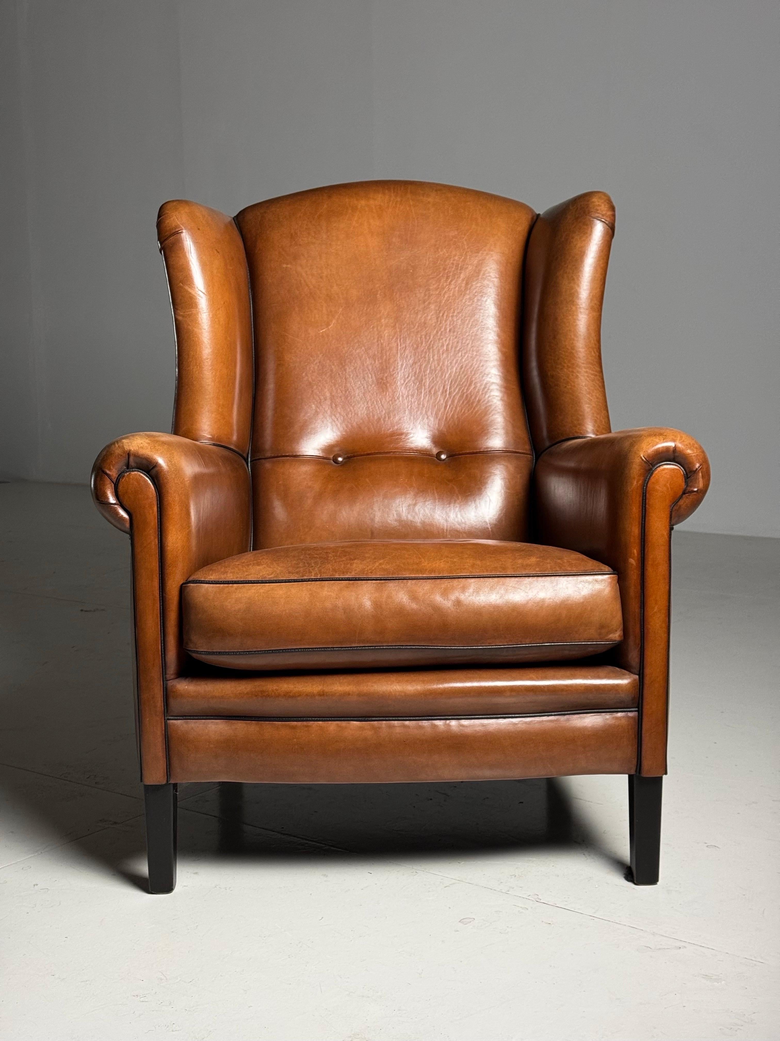 Poltrona Wingback / Clubchair in pelle di pecora molto bella. In condizioni nuove!