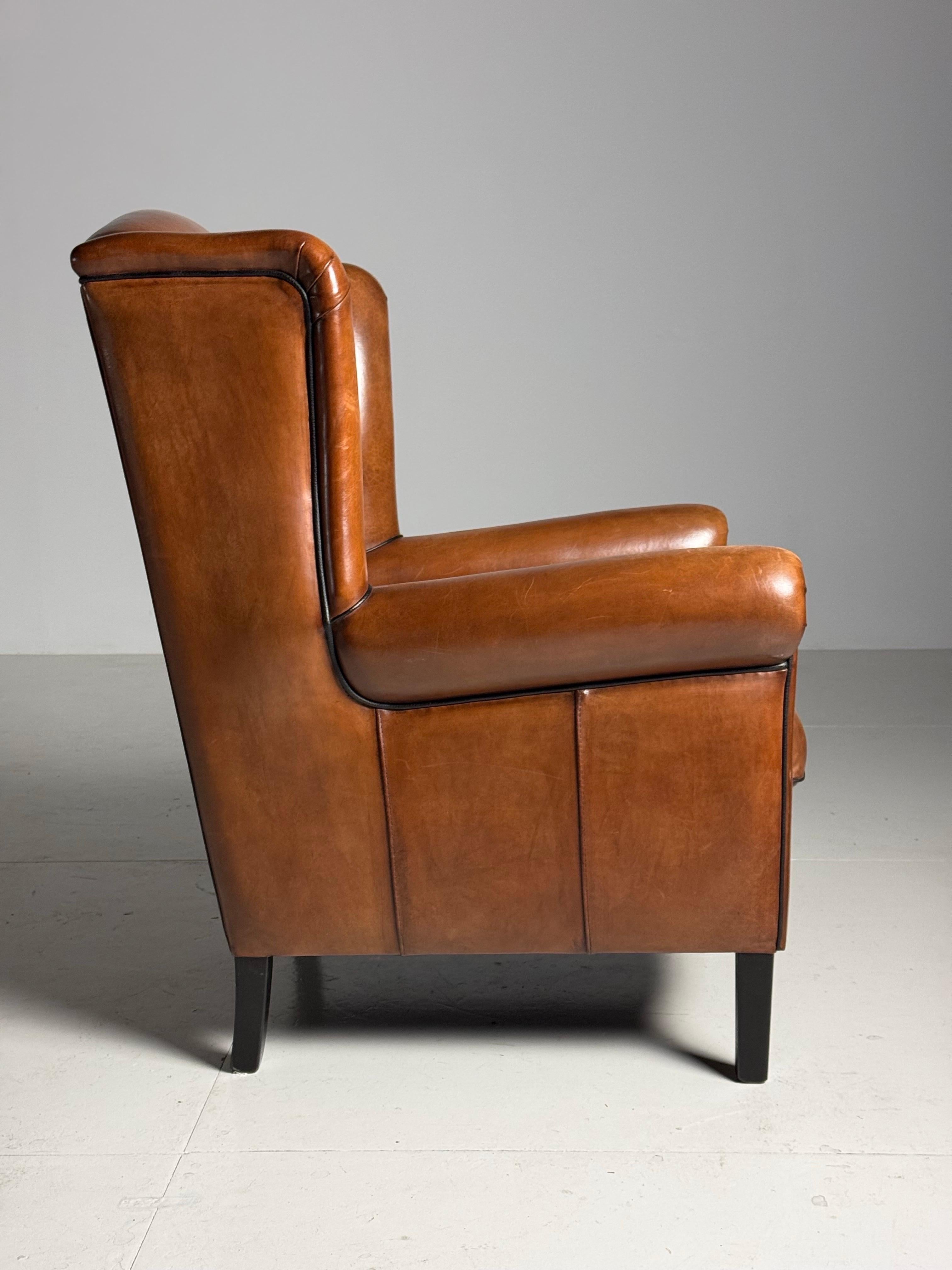 Poltrona wingback in pelle di pecora In condizioni ottime in vendita a MILL, NL