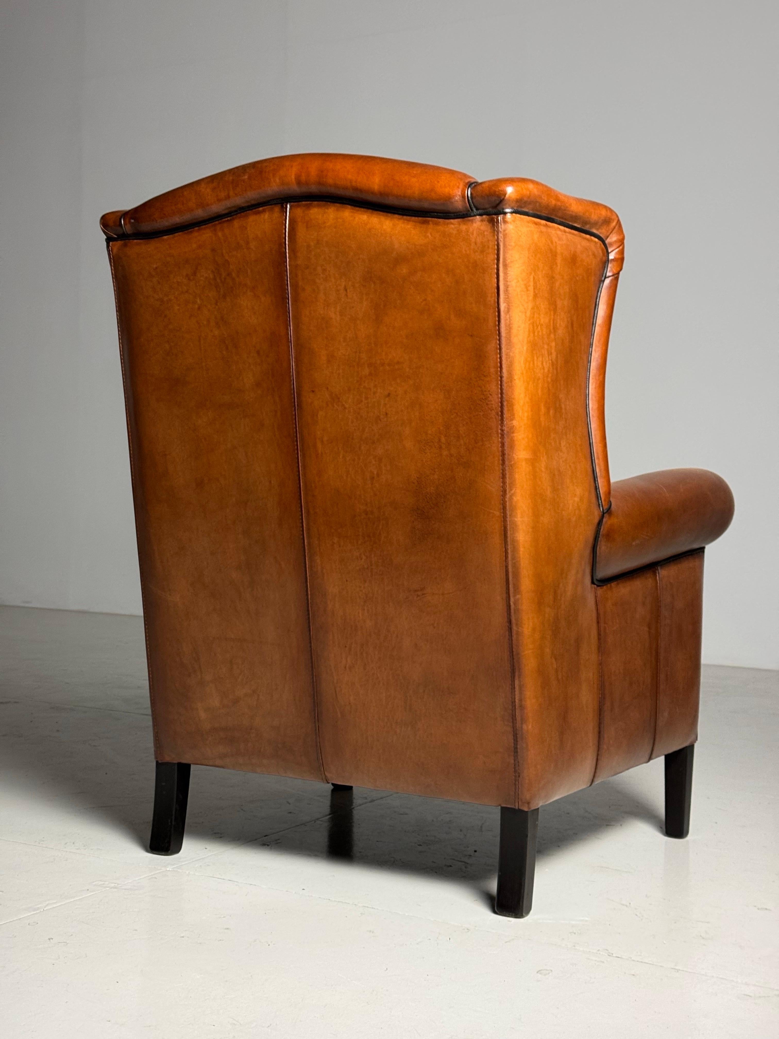 XX secolo Poltrona wingback in pelle di pecora in vendita