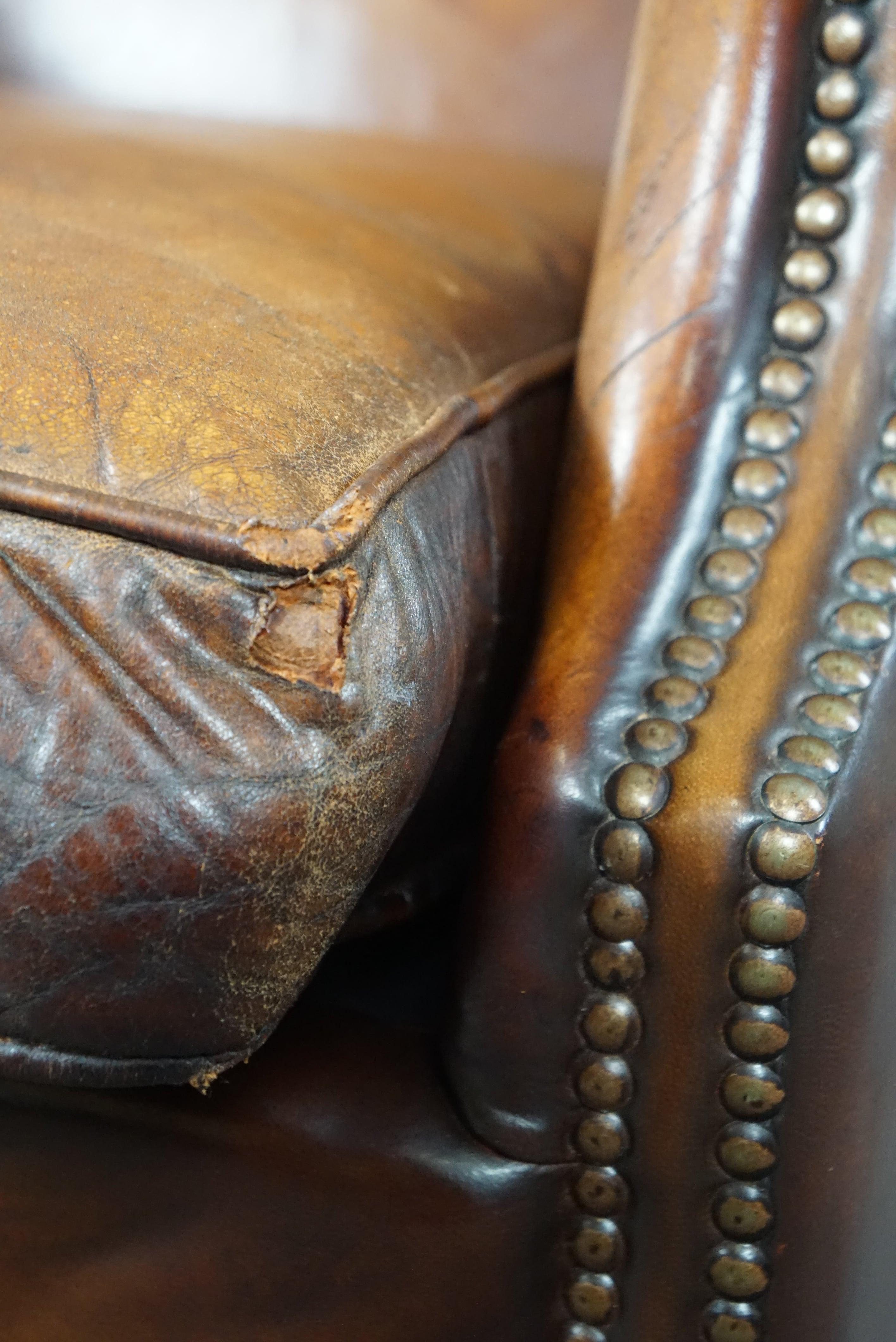 Sheep leather wingback chair with a beautiful patina For Sale 5