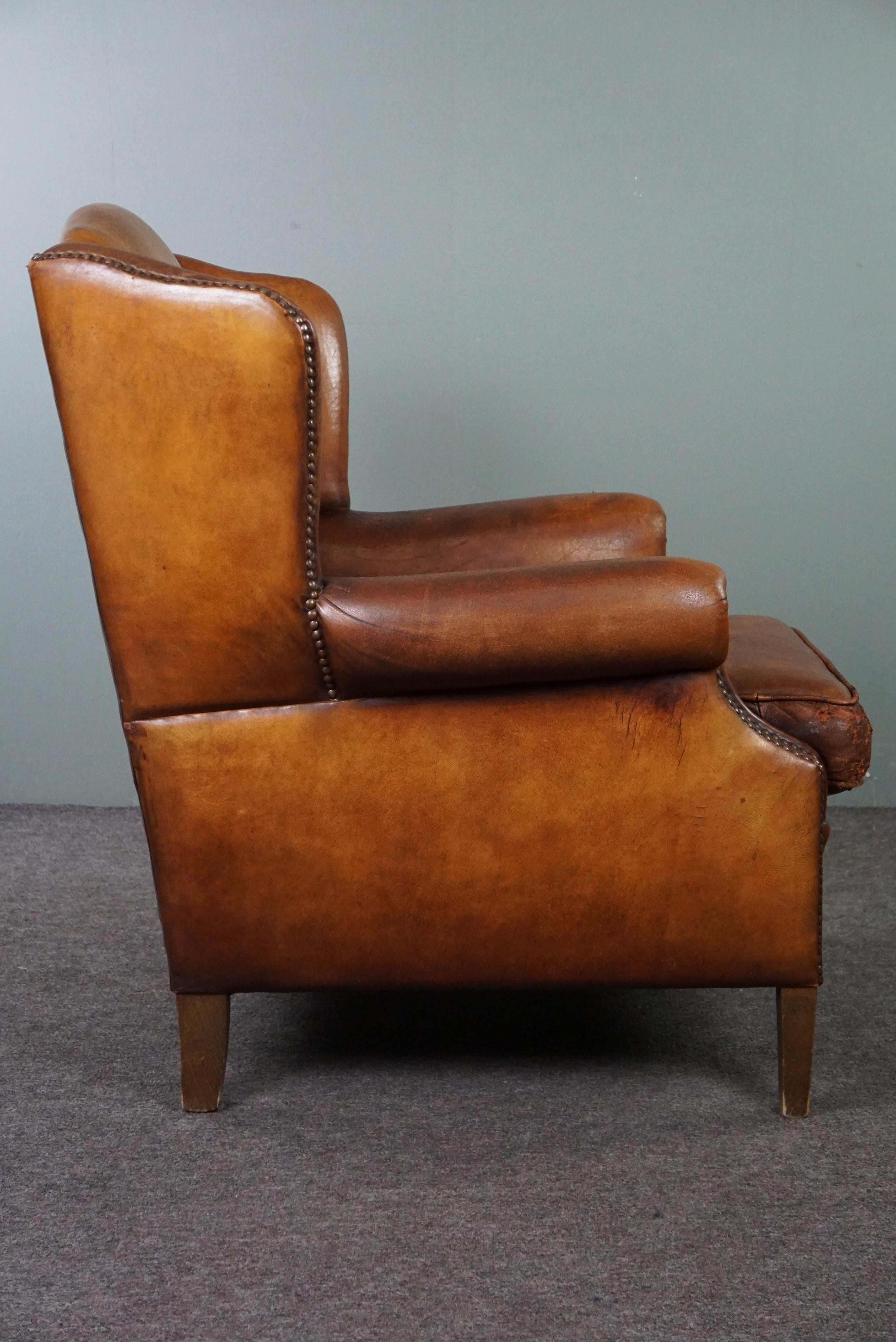 Sheep leather wingback chair with a beautiful patina In Good Condition For Sale In Harderwijk, NL