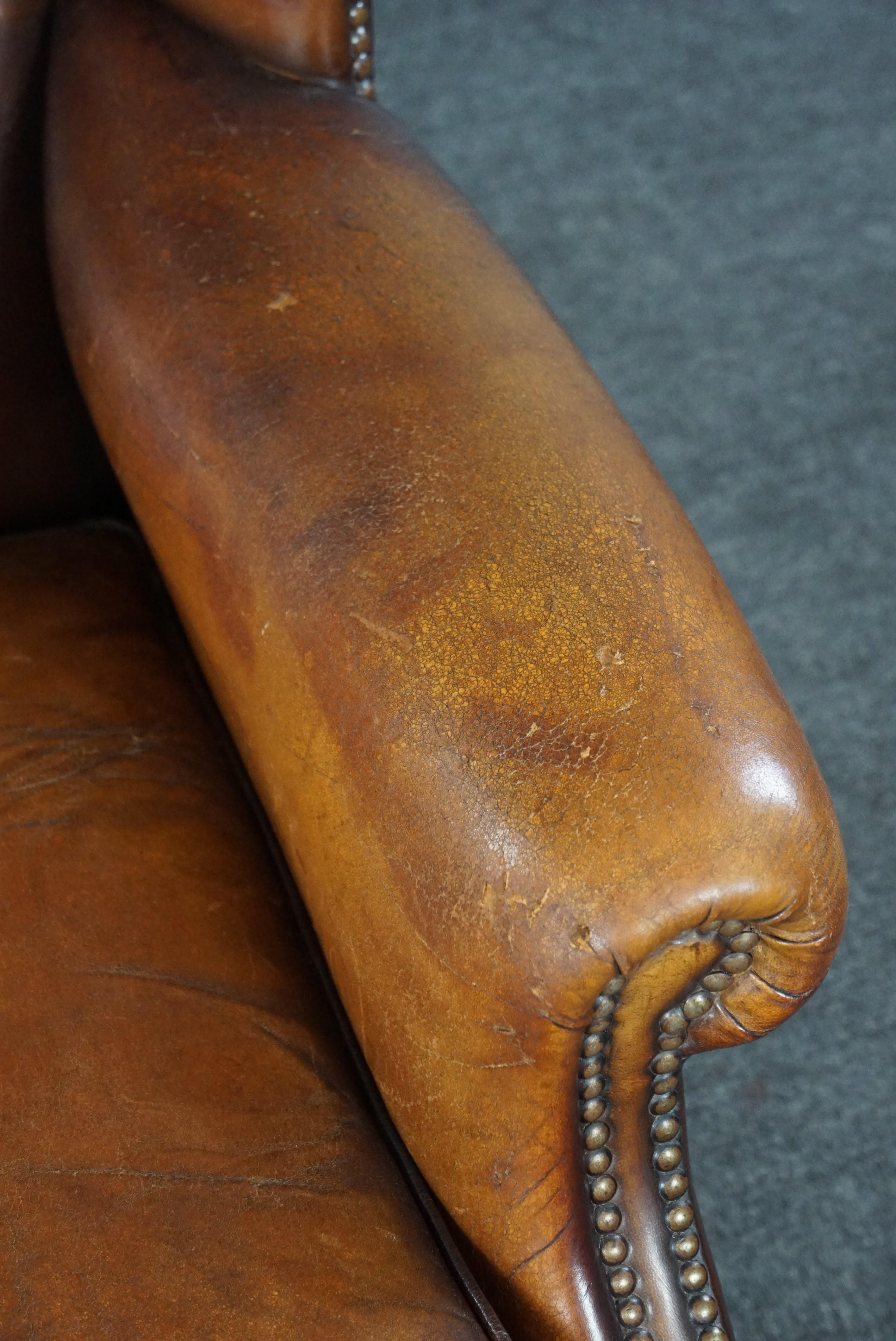 Sheep leather wingback chair with a beautiful patina For Sale 3