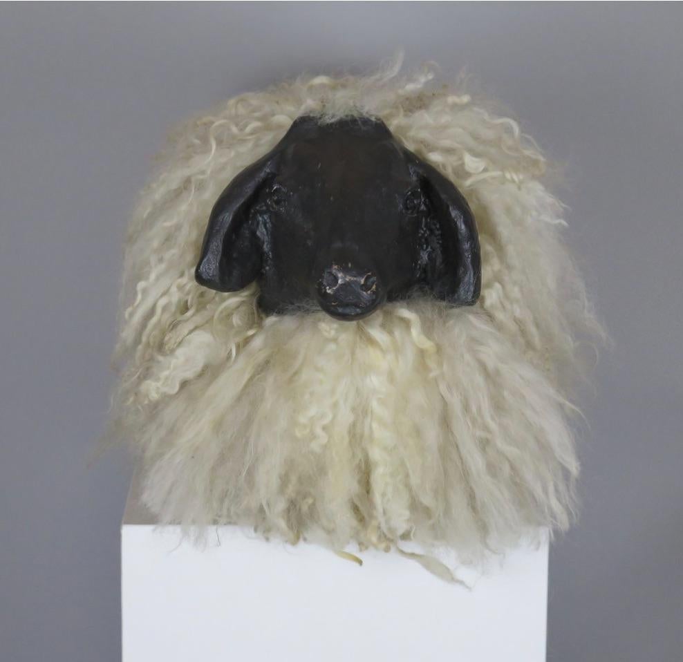 Handmade Sheep Sculpture. Hand-painted wood base and face with real sheep's fur.  France, circa 1980.
