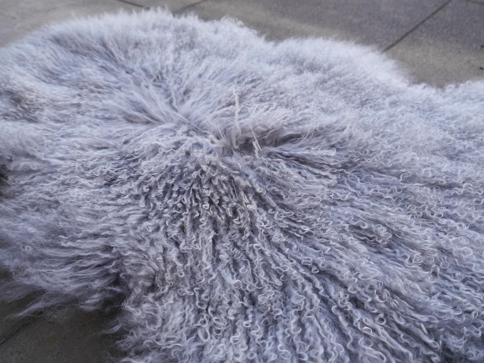 Sheep skin rug Tibetan Mongolian long hair curley hide

Our premium sheep skin rugs are of excellent quality, all hand selected. They go great with many decor styles such as South Western, Industrial, Midcentury, Hollywood Regency and contemporary