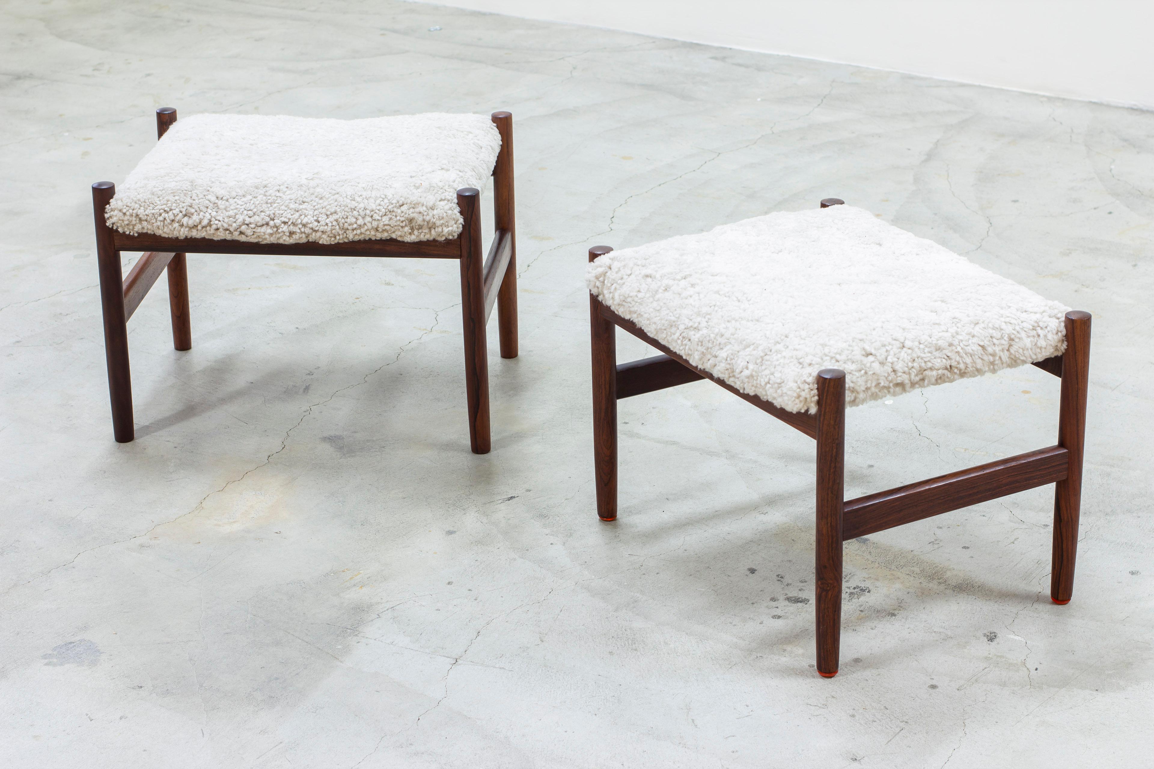 Pair of stools designed by Hugo Frandsen. Produced by Spøttrup in Denmark during the 1960s. Made from solid walnut with new sheep skin upholstery. Very good vintage condition with light signs of age related wear and patina.

 

Price for the pair.