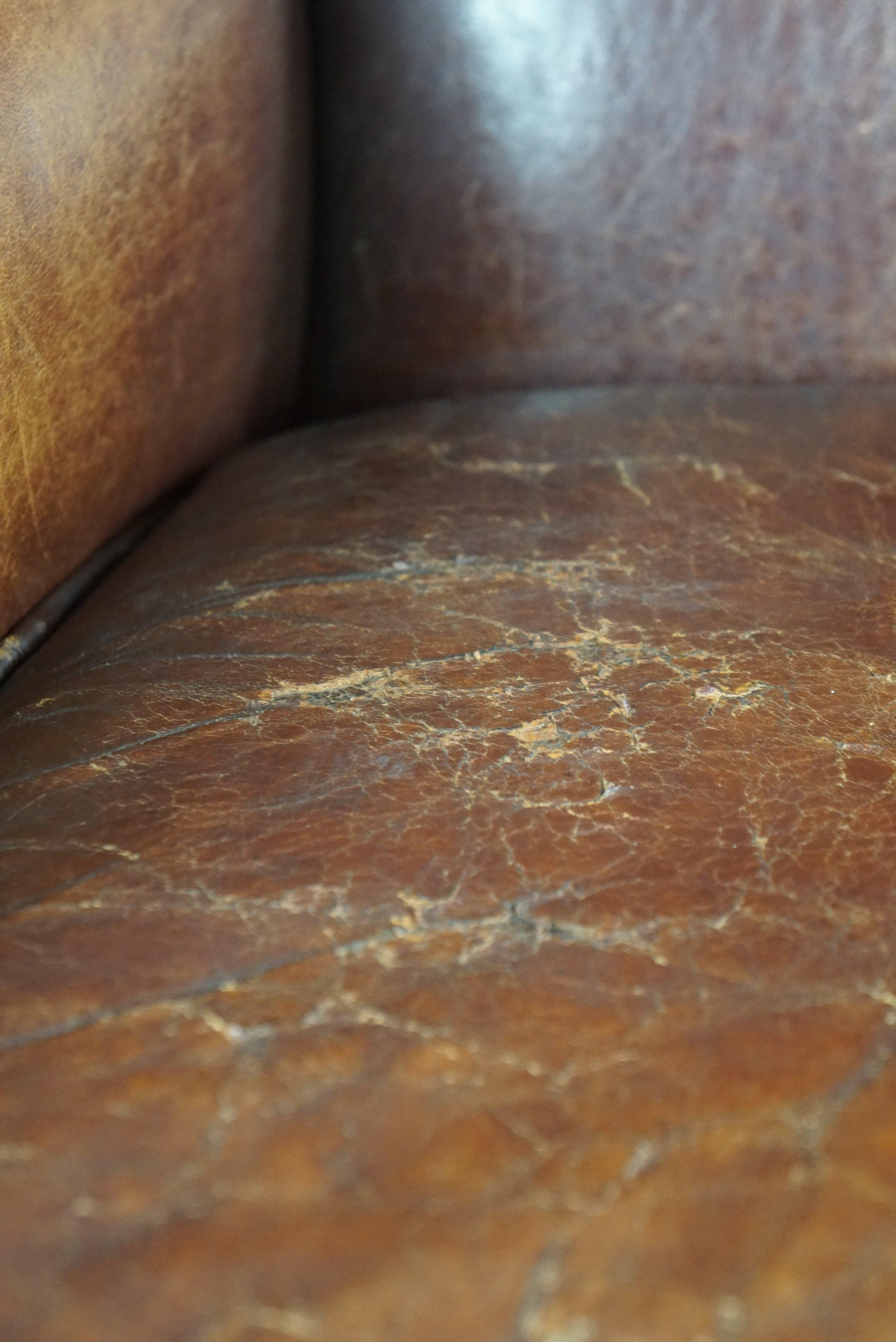 Sheepskin armchair with a wonderful patina and a correct worn look For Sale 3