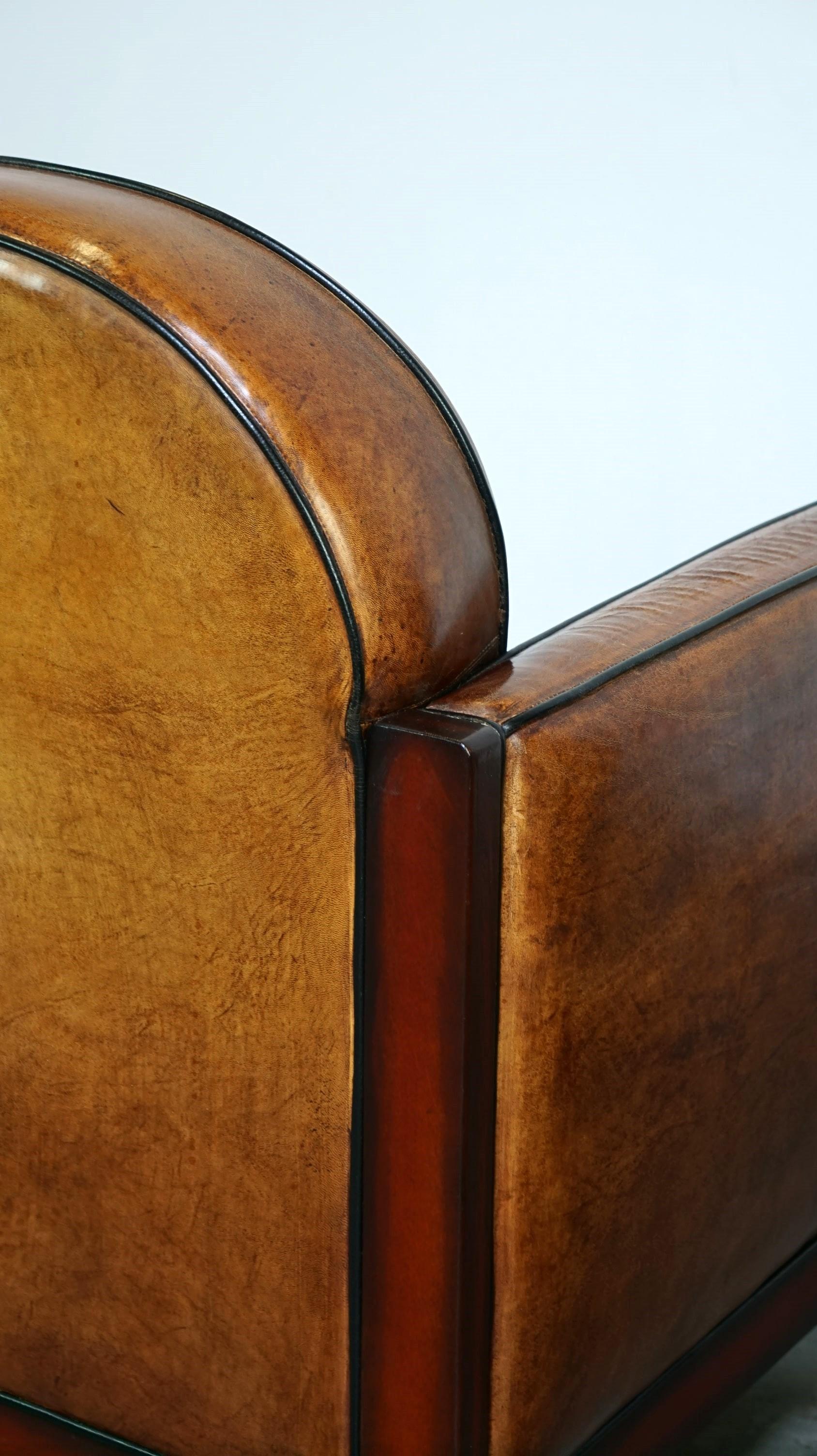 Sheepskin Art Deco design armchair finished with wood and cognac-colored leather For Sale 7