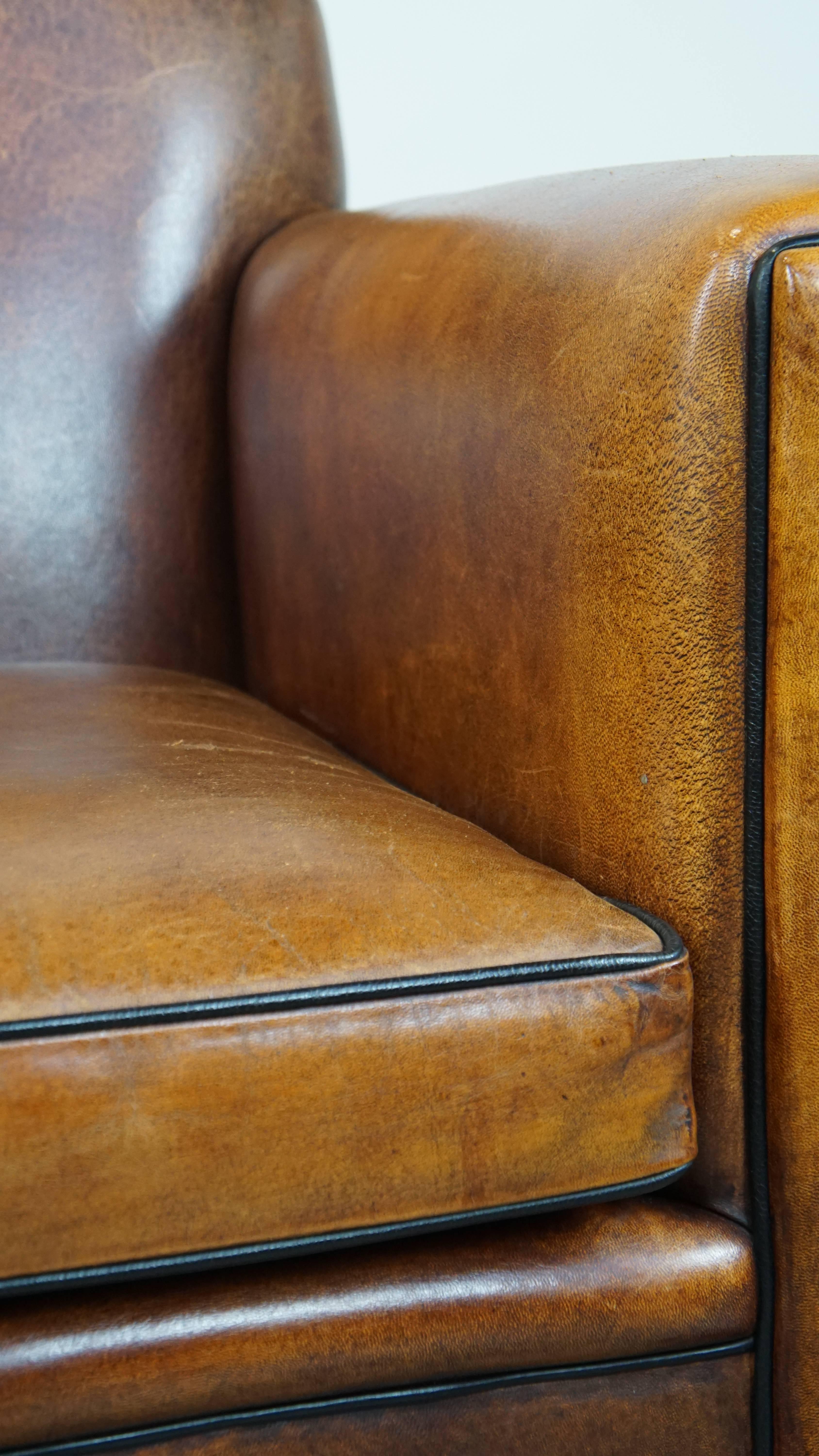 Art-Déco-Sessel aus Schafsleder in gutem Zustand, mit schwarzer Paspelierung im Angebot 5