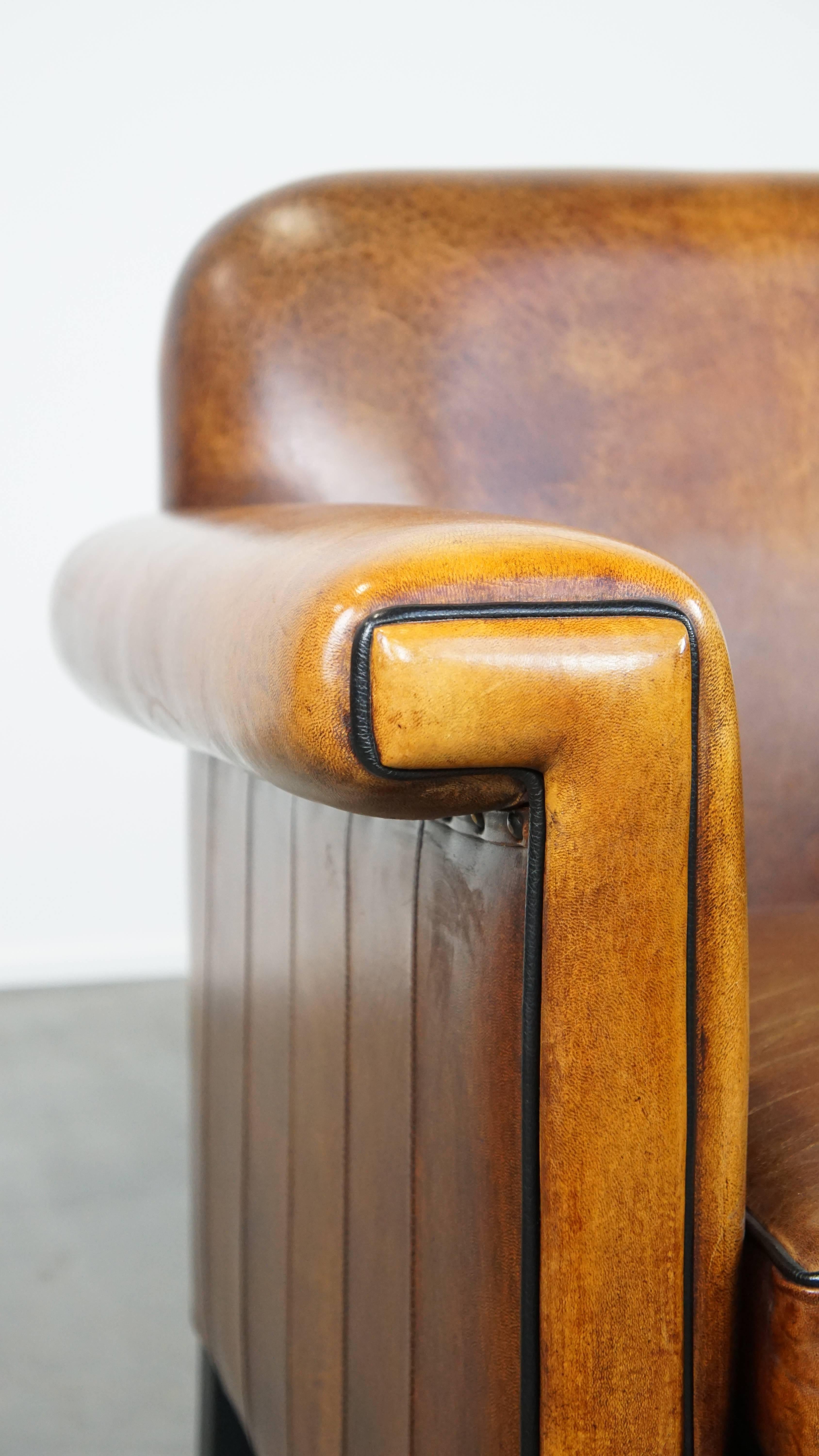 Art-Déco-Sessel aus Schafsleder in gutem Zustand, mit schwarzer Paspelierung im Angebot 6