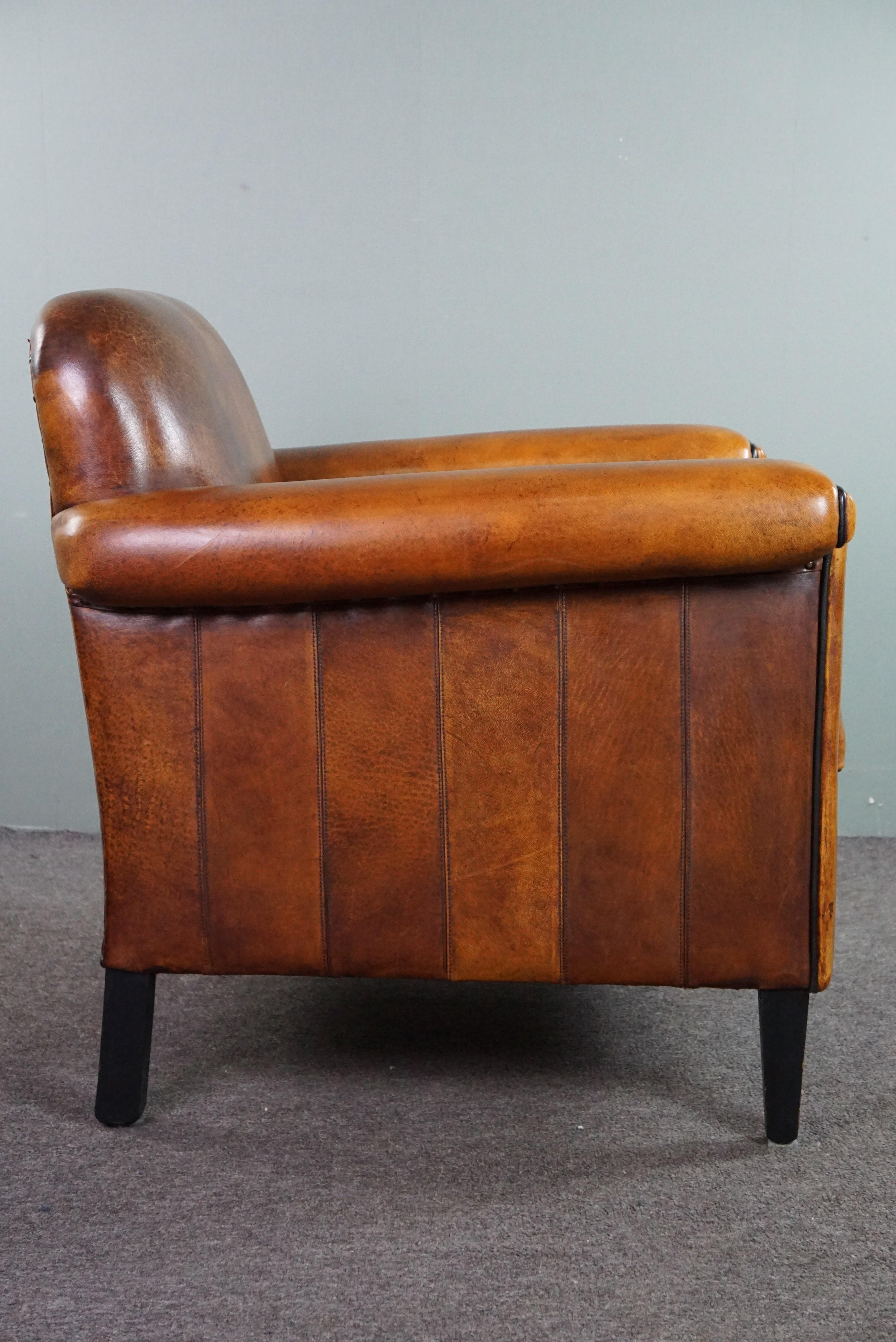 Sheepskin Art Deco design armchair with accents all around In Good Condition For Sale In Harderwijk, NL