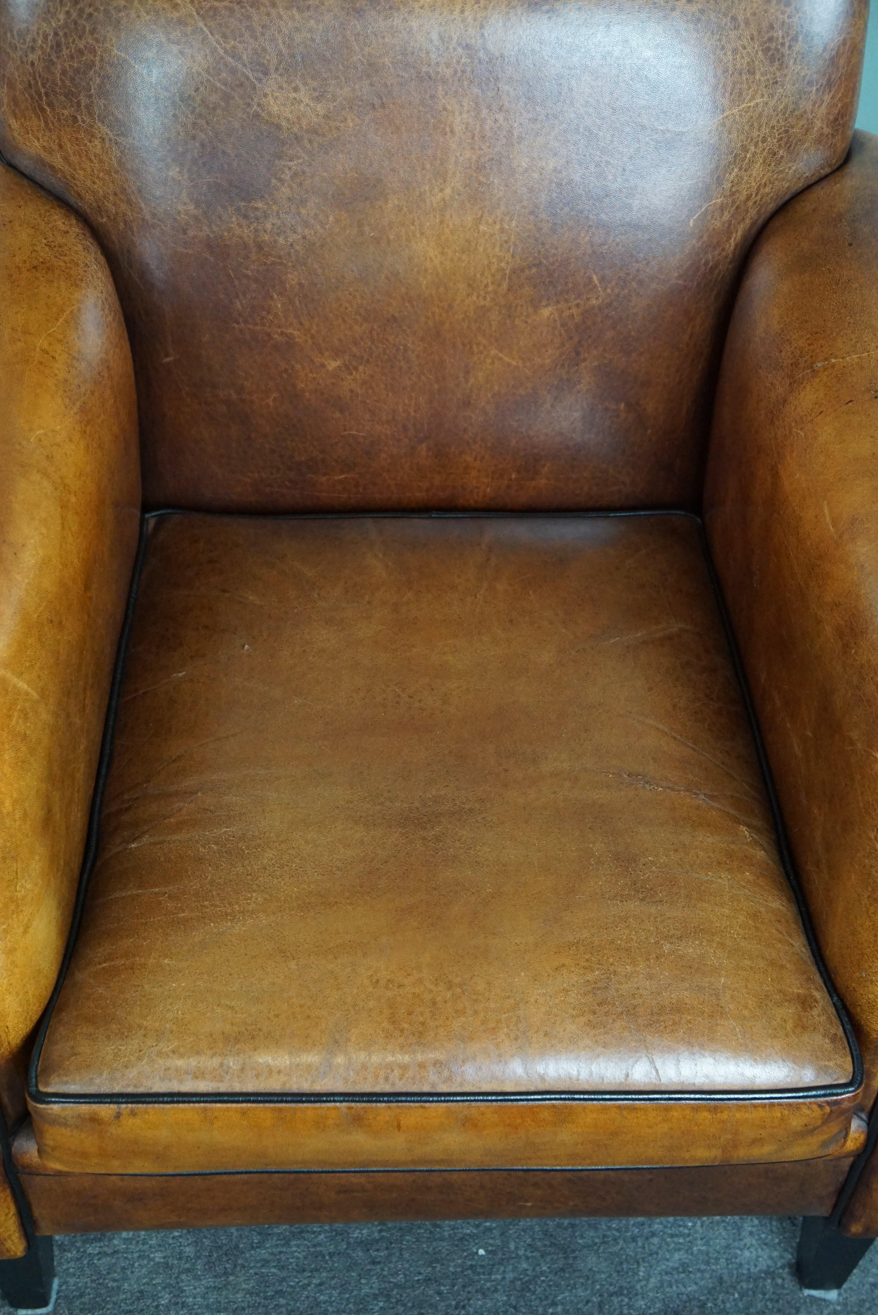 Sheepskin Art Deco design armchair with accents all around For Sale 1