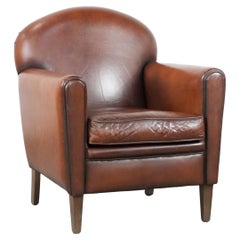 Schafsfell Art Deco Design Sessel mit zeitlosen und warmen Farben