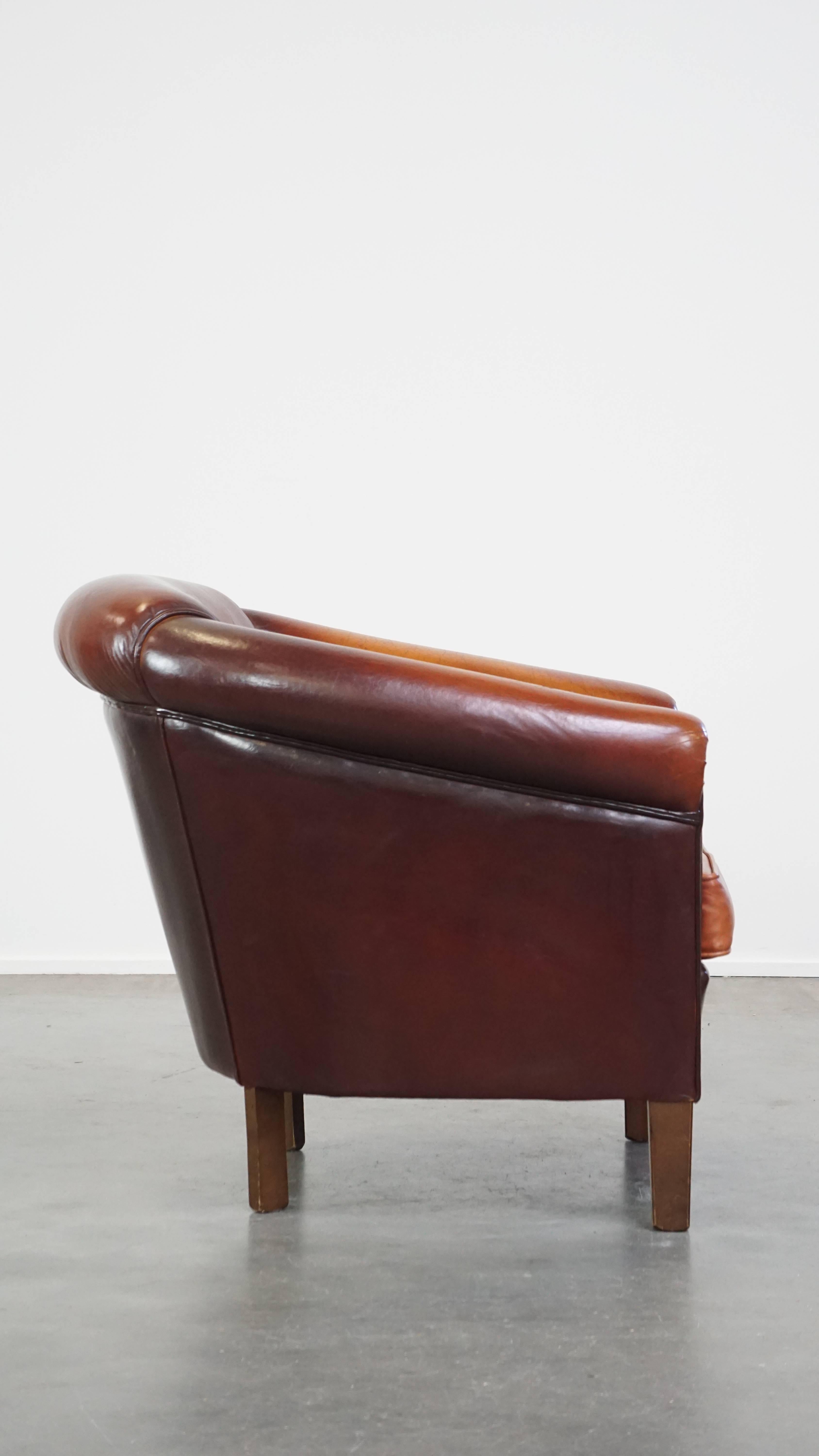 Hand-Crafted Sheepskin club chair with beautiful colors and comfortable seating For Sale
