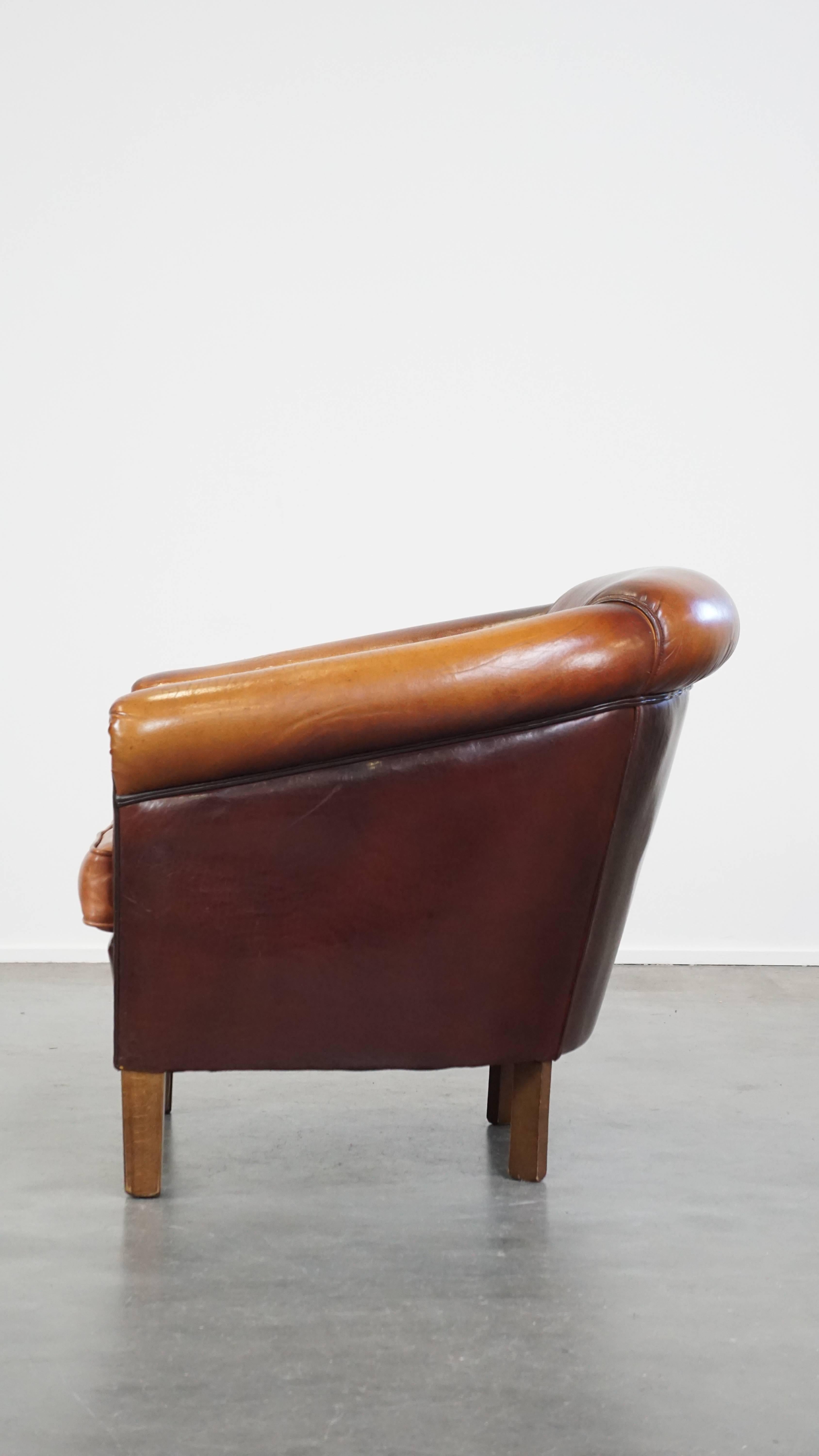 20th Century Sheepskin club chair with beautiful colors and comfortable seating For Sale