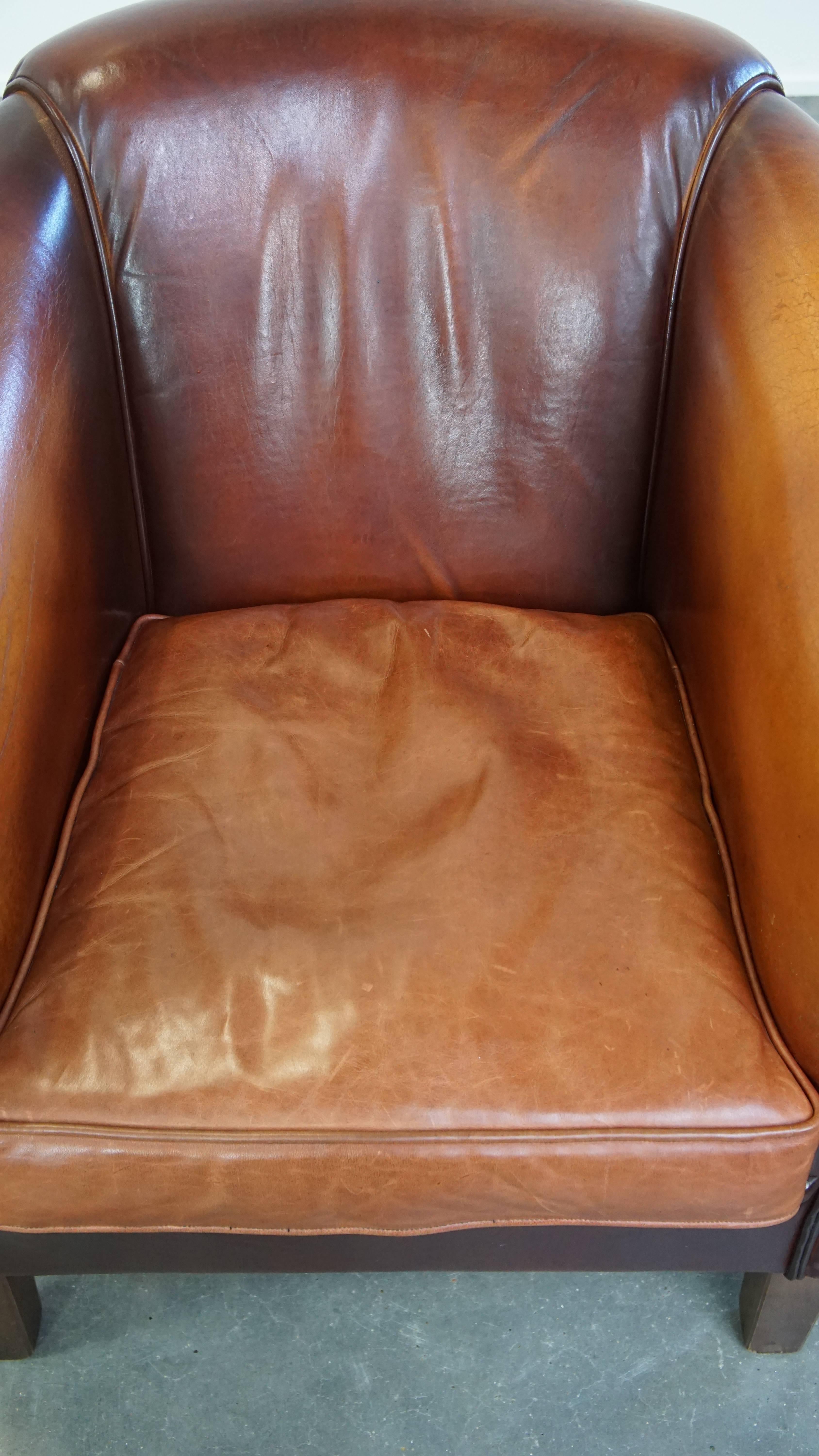 Cowhide Sheepskin club chair with beautiful colors and comfortable seating For Sale