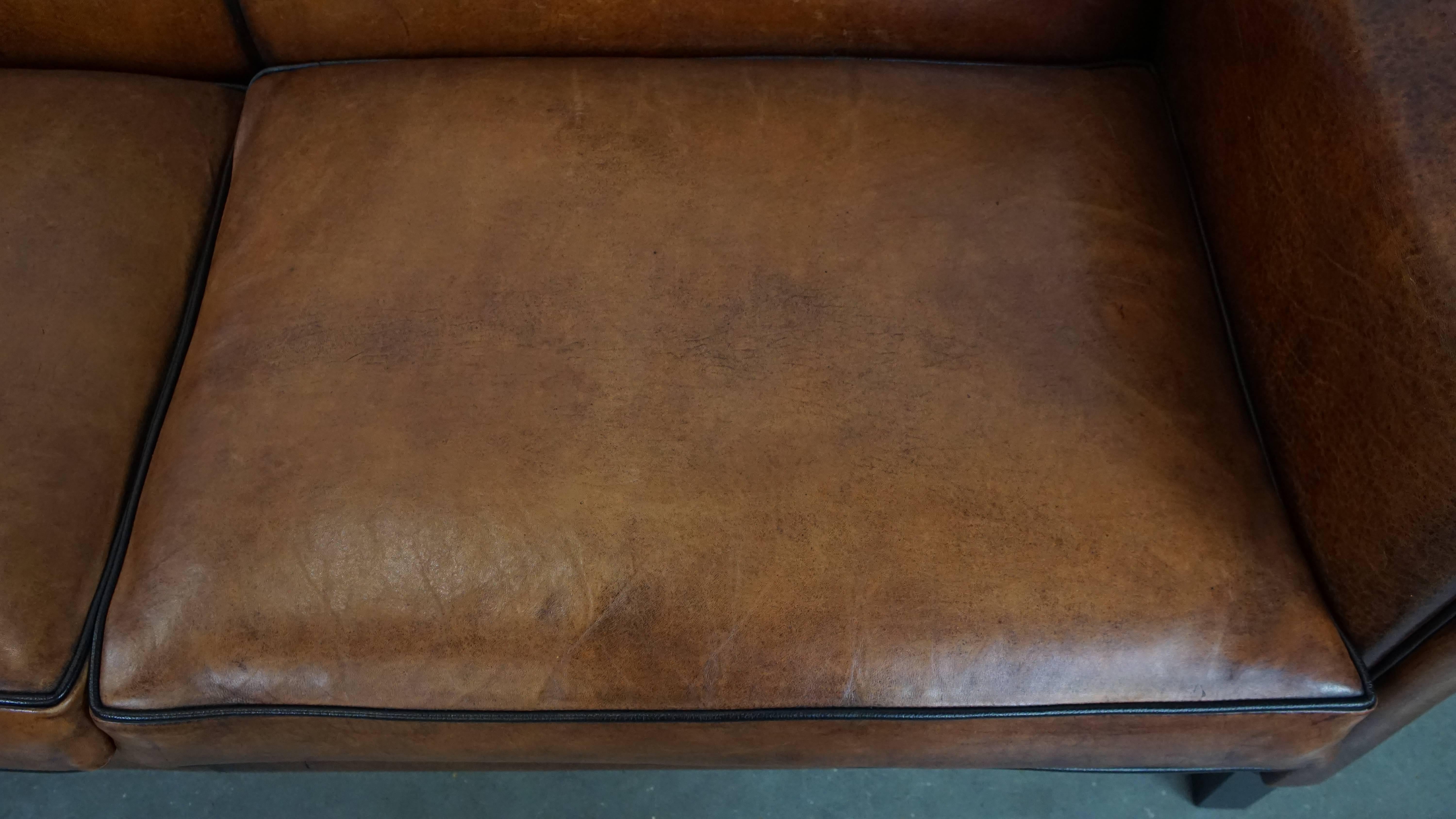 20ième siècle Canapé Art Déco 2 places en cuir de mouton en vente