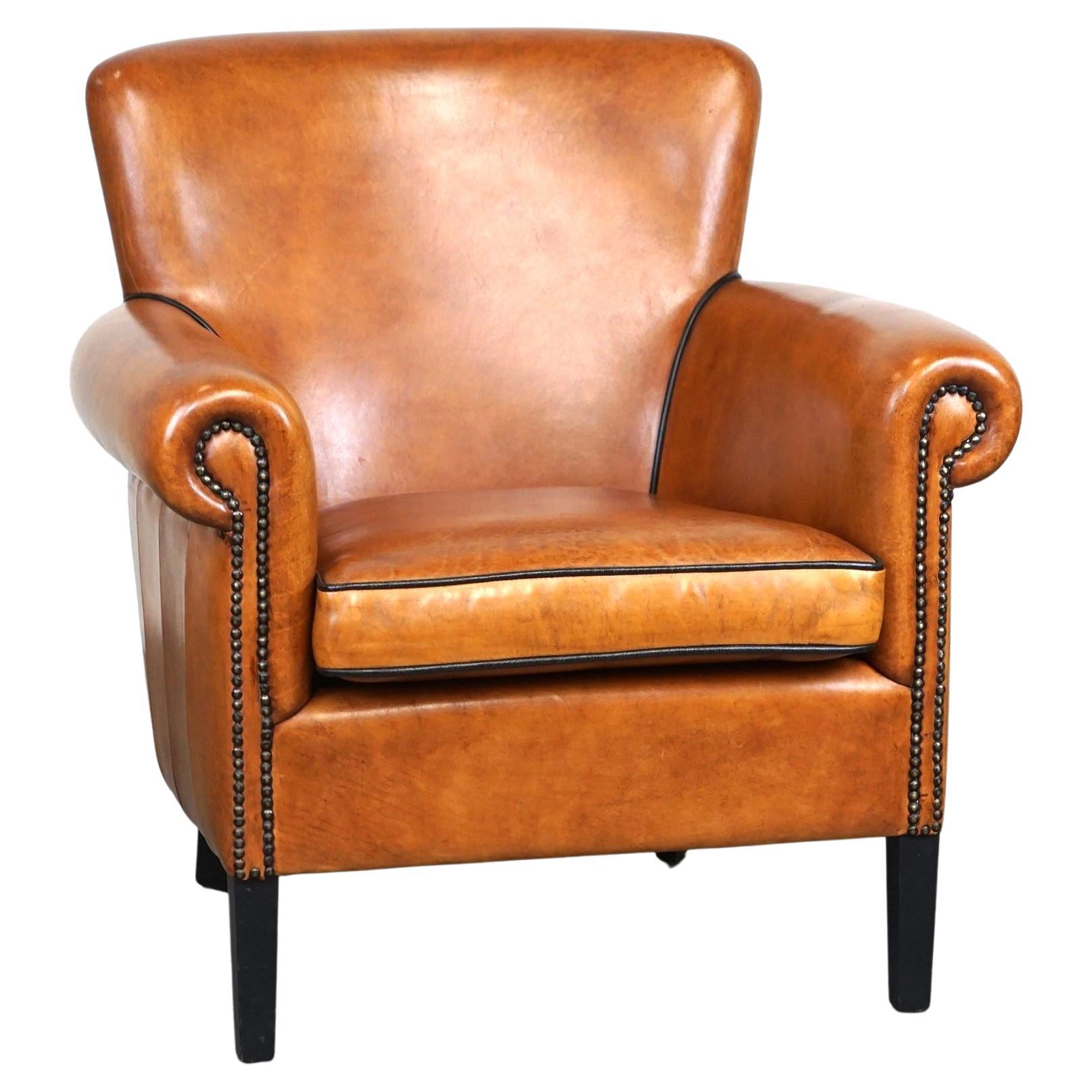 Sheepskin leather armchair with a luxurious appearance For Sale