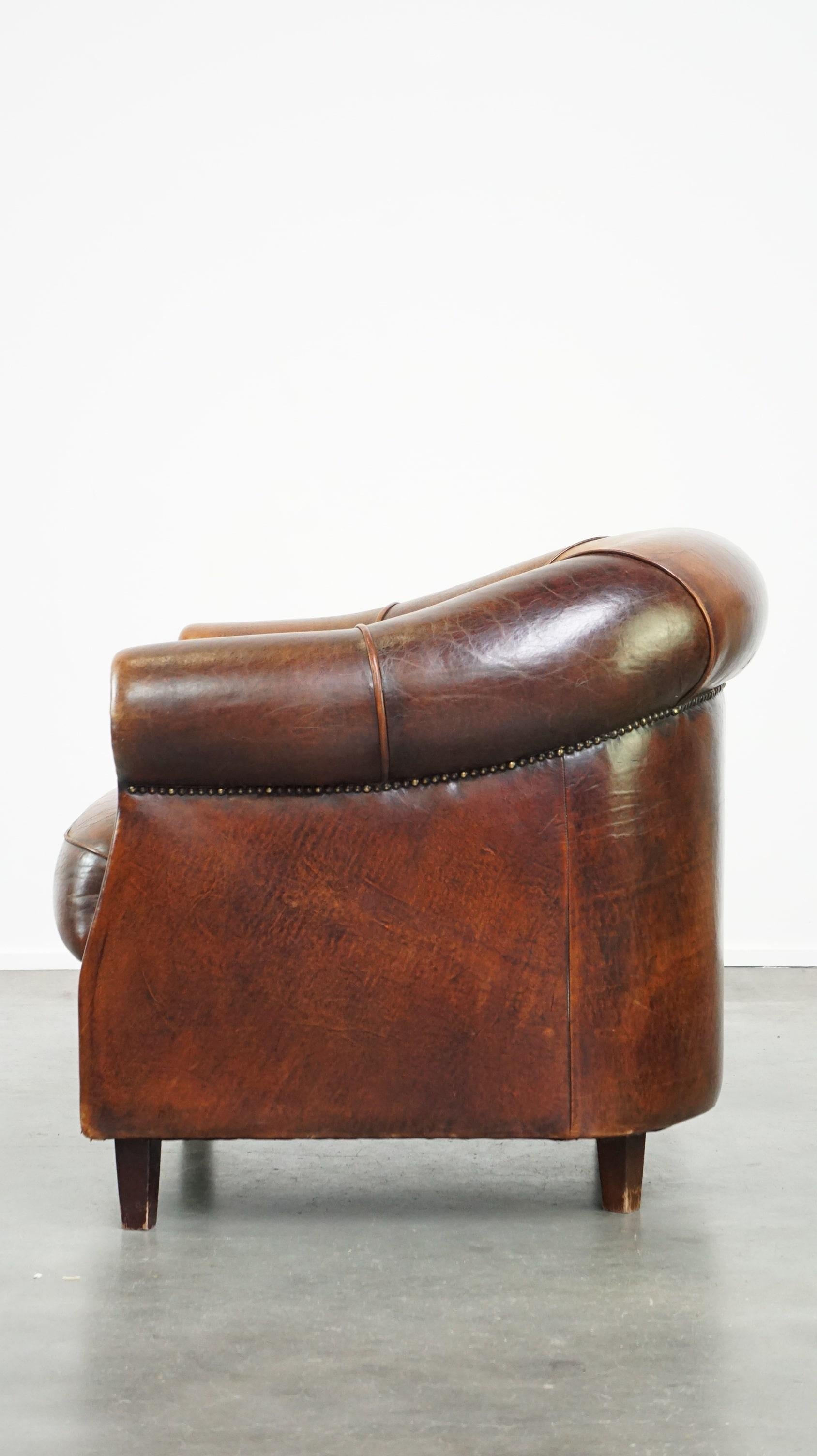 Sheepskin leather club armchair with beautiful colors and comfortable seating In Fair Condition For Sale In Harderwijk, NL