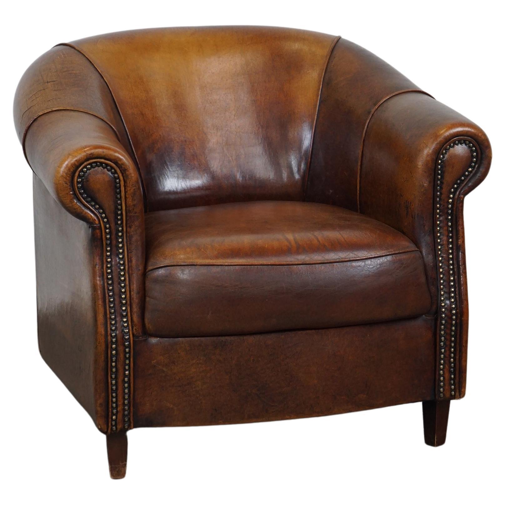 Sheepskin leather club armchair with beautiful colors and comfortable seating