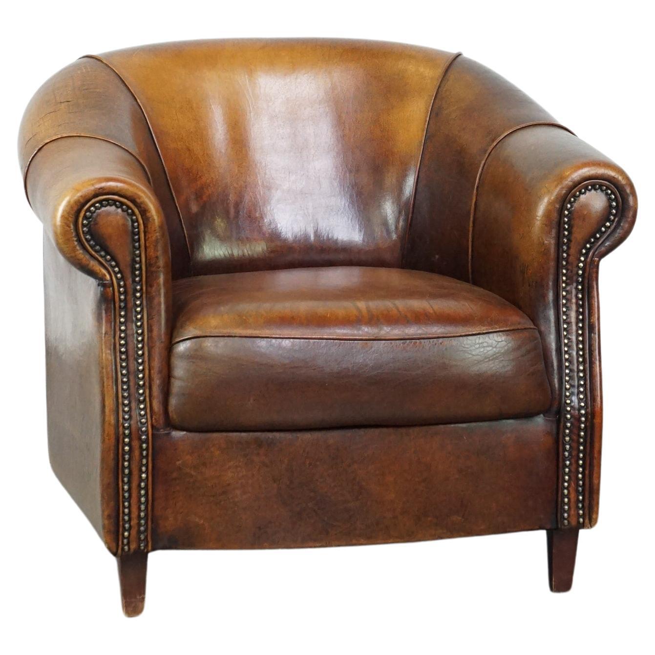 Sheepskin leather club armchair with beautiful colors and comfortable seating