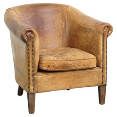 Fauteuil club en cuir de mouton